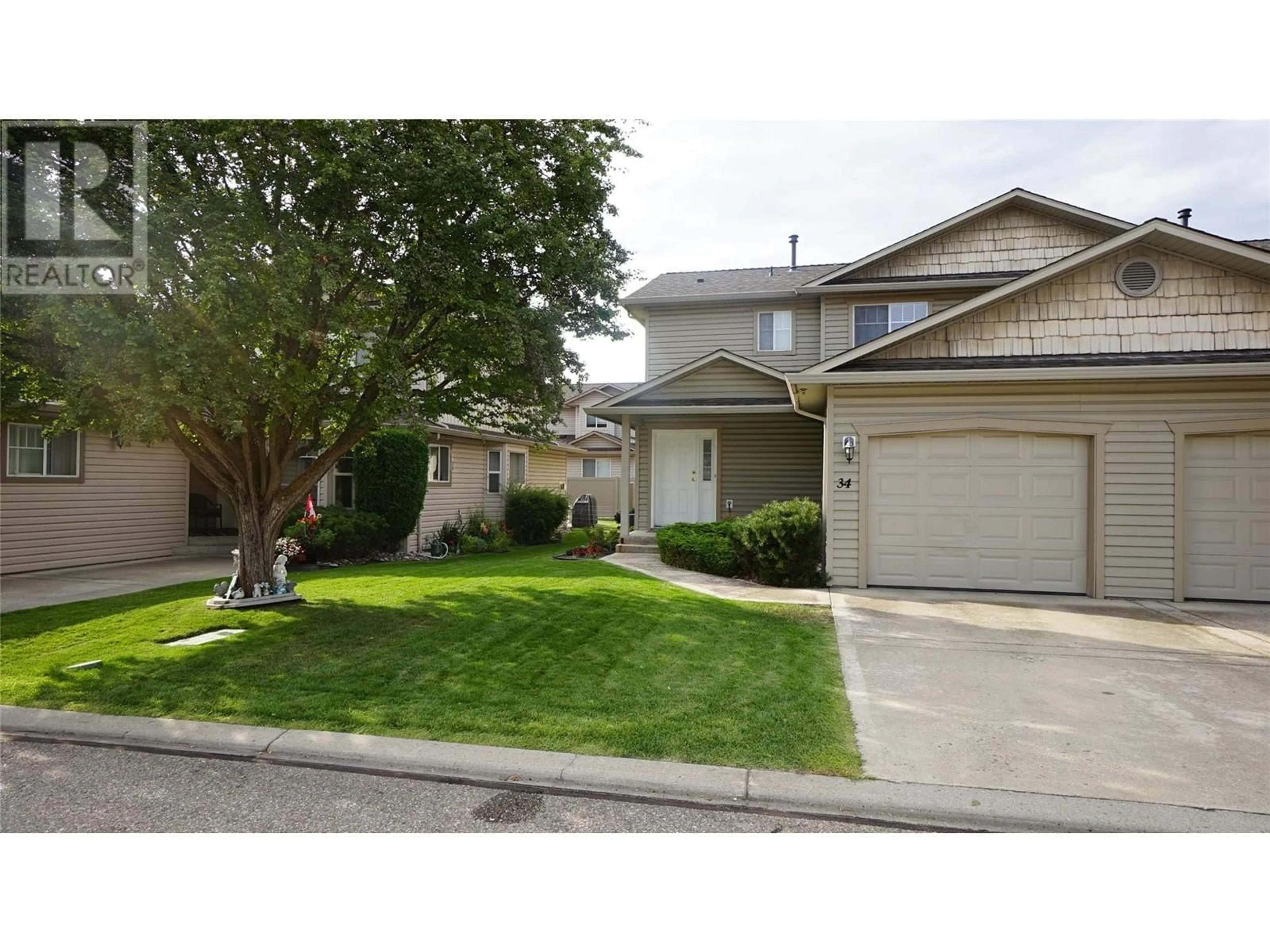 Frontside or backside of a home for 5886 Okanagan Landing Road Unit# 34, Vernon British Columbia V1H1S1