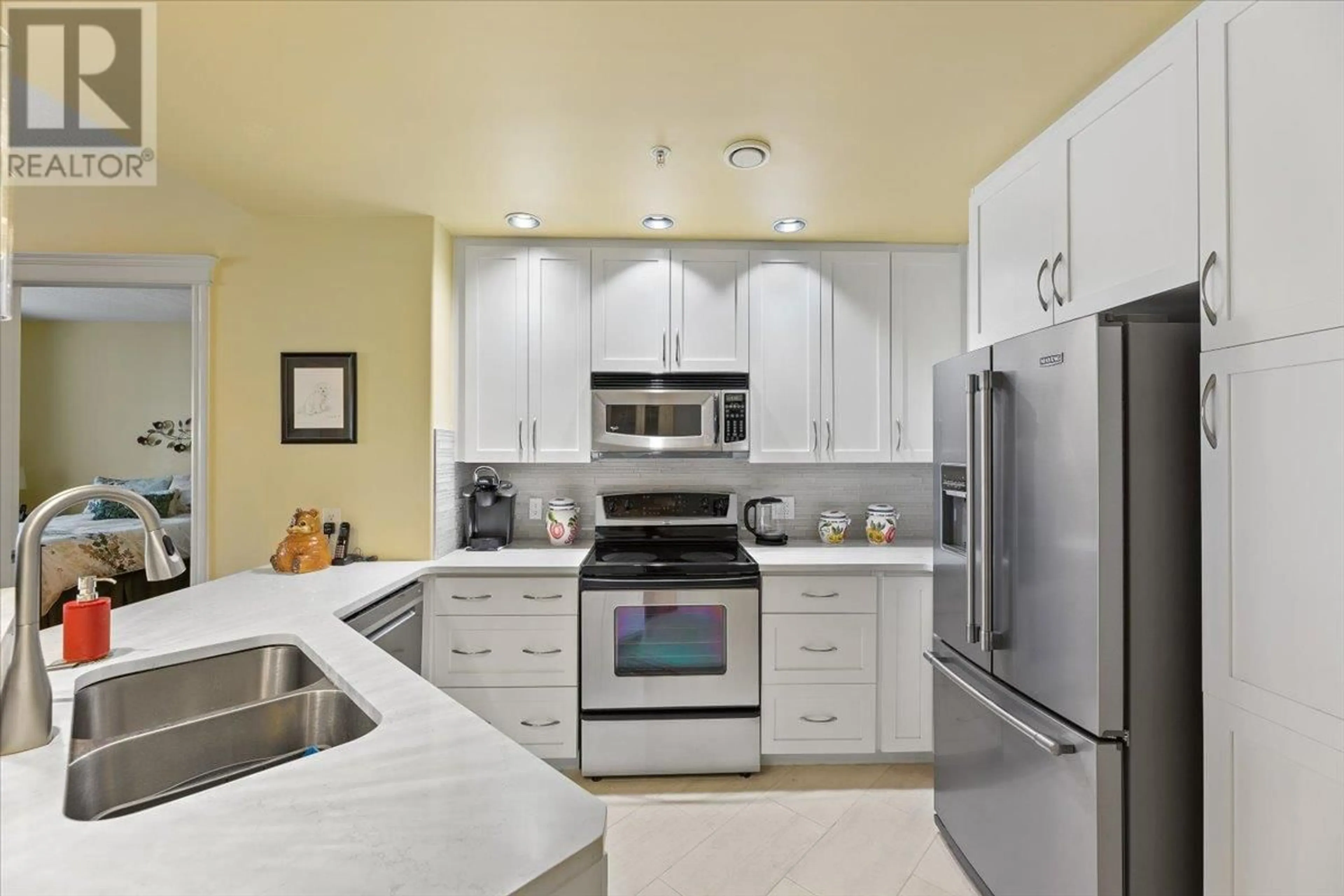 Standard kitchen, ceramic floors for 1947 Underhill Street Unit# 408, Kelowna British Columbia V1X7Z5