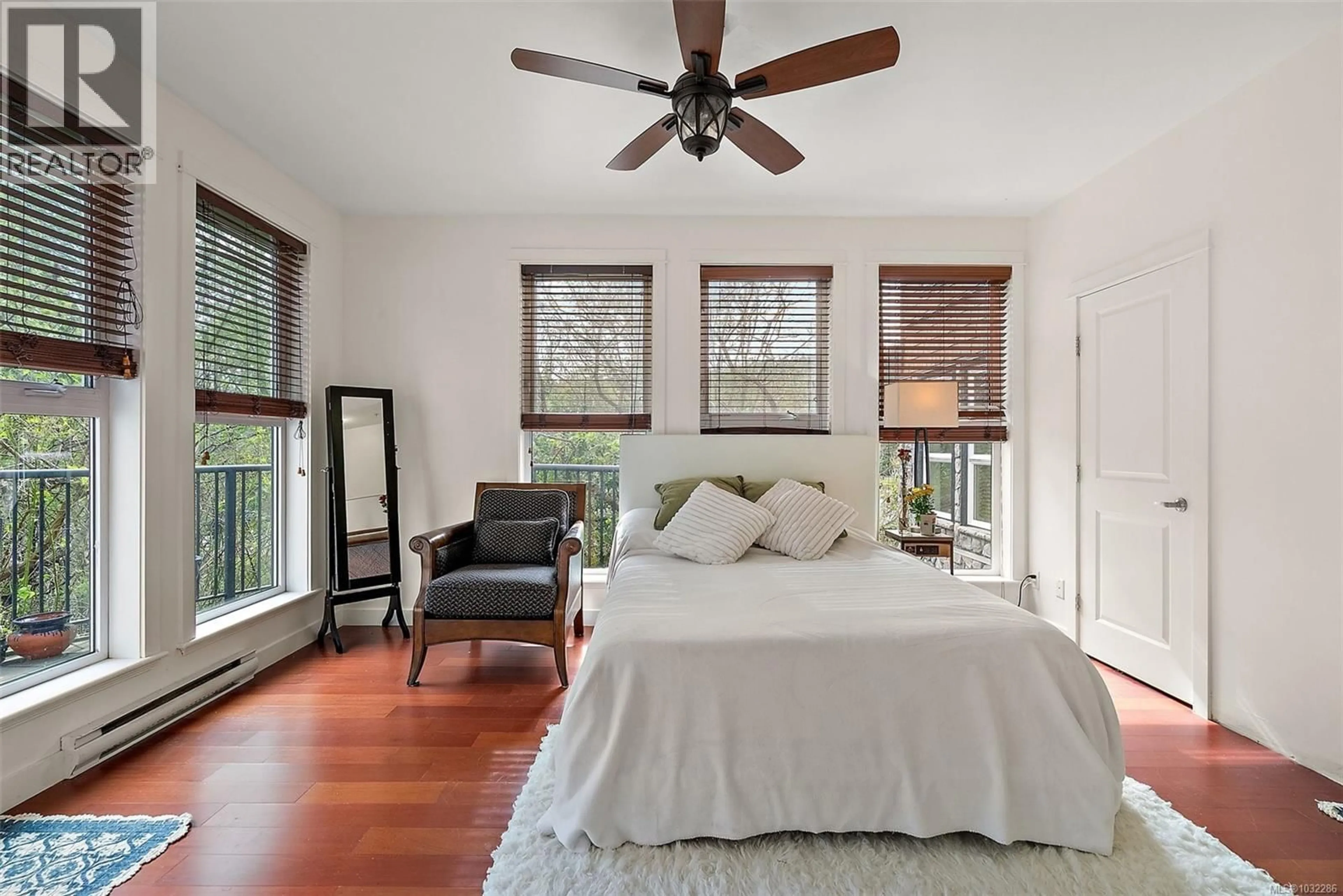 Bedroom with bed, wood/laminate floor for 104 - 101 NURSERY HILL DRIVE, View Royal British Columbia V9B0H5