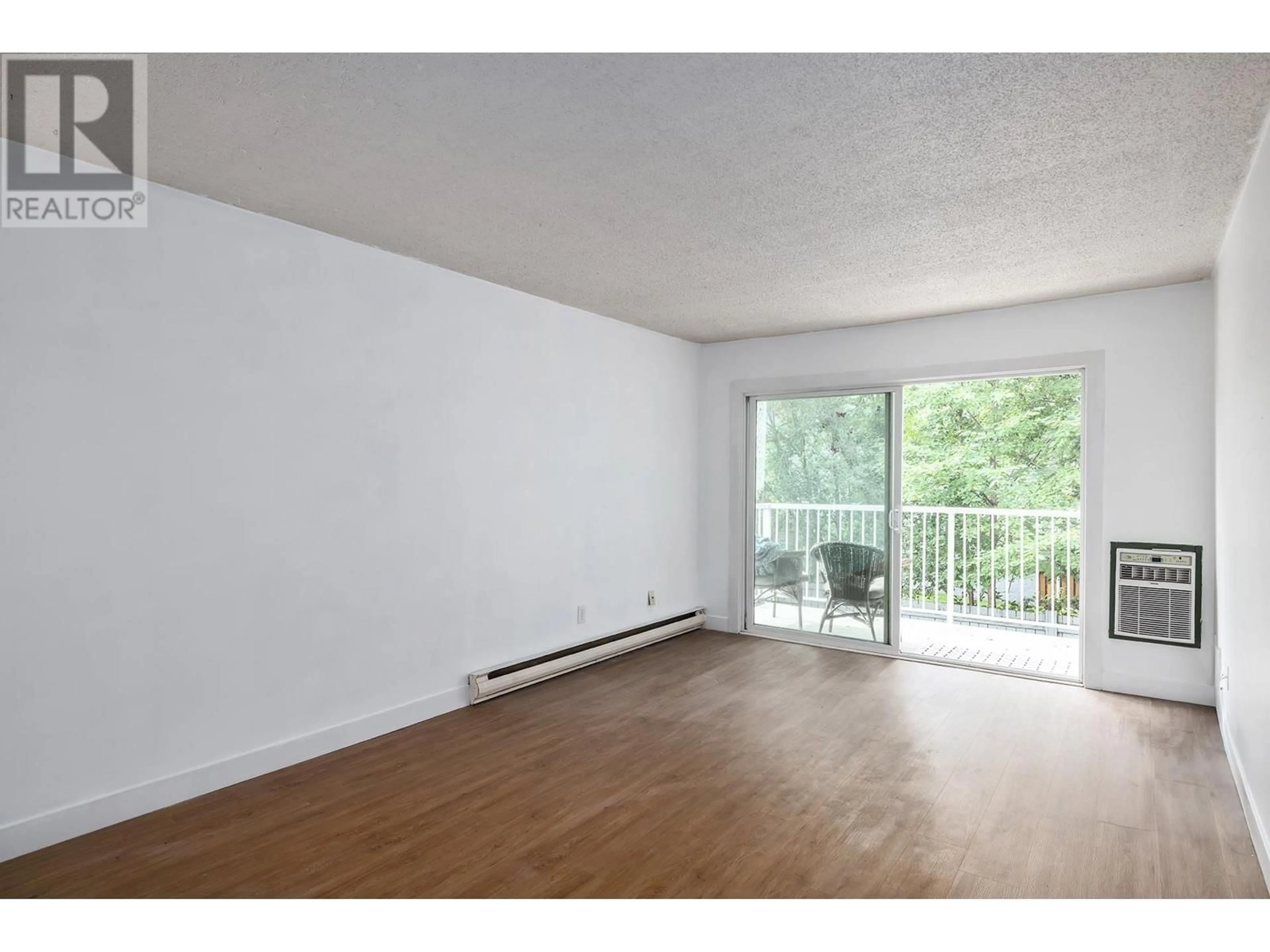 A pic of a room, wood floors for 395 FRANKLYN Road Unit# 205 Lot# SL20, Kelowna British Columbia V1X5X8