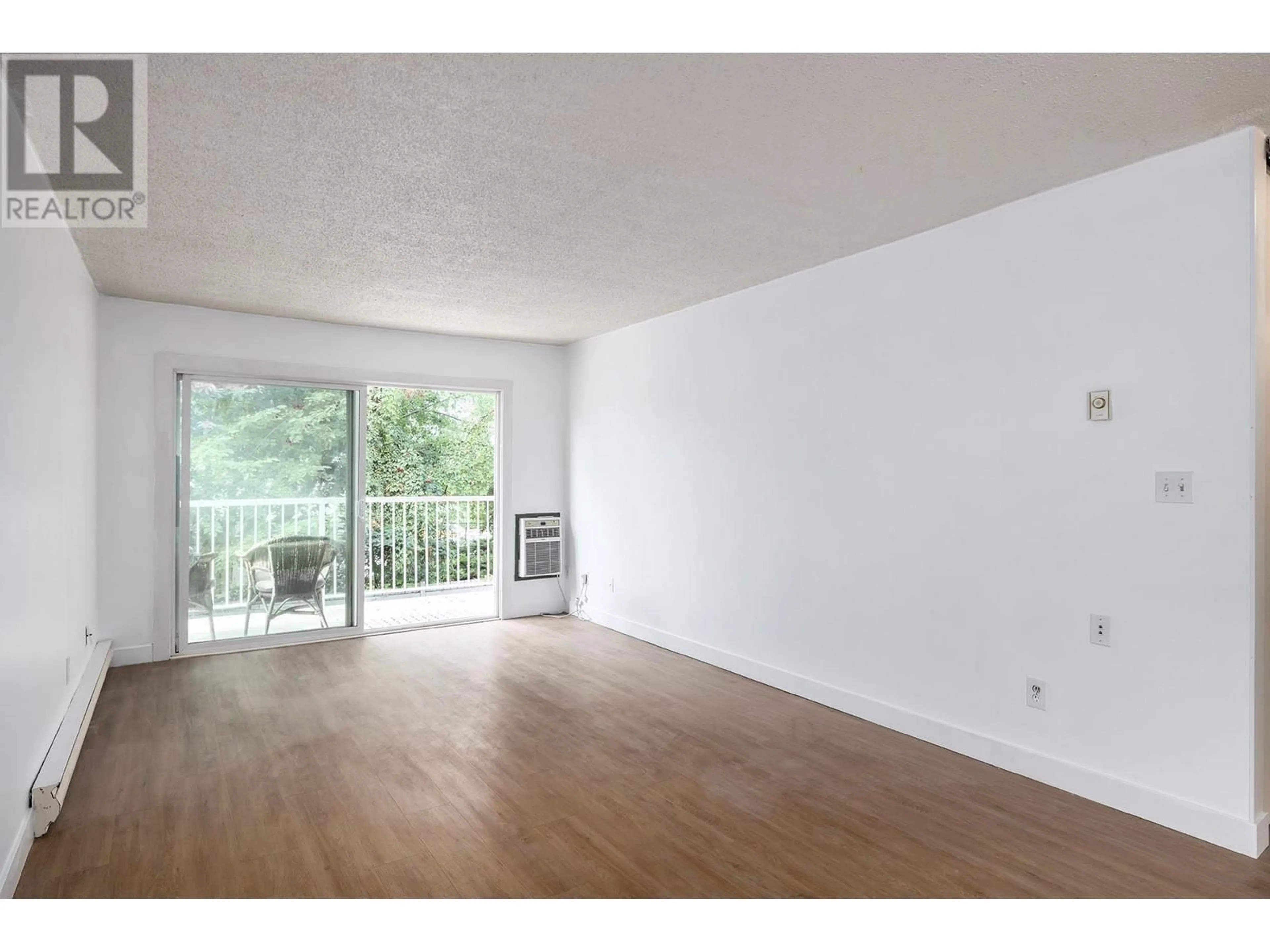 A pic of a room, wood floors for 395 FRANKLYN Road Unit# 205 Lot# SL20, Kelowna British Columbia V1X5X8