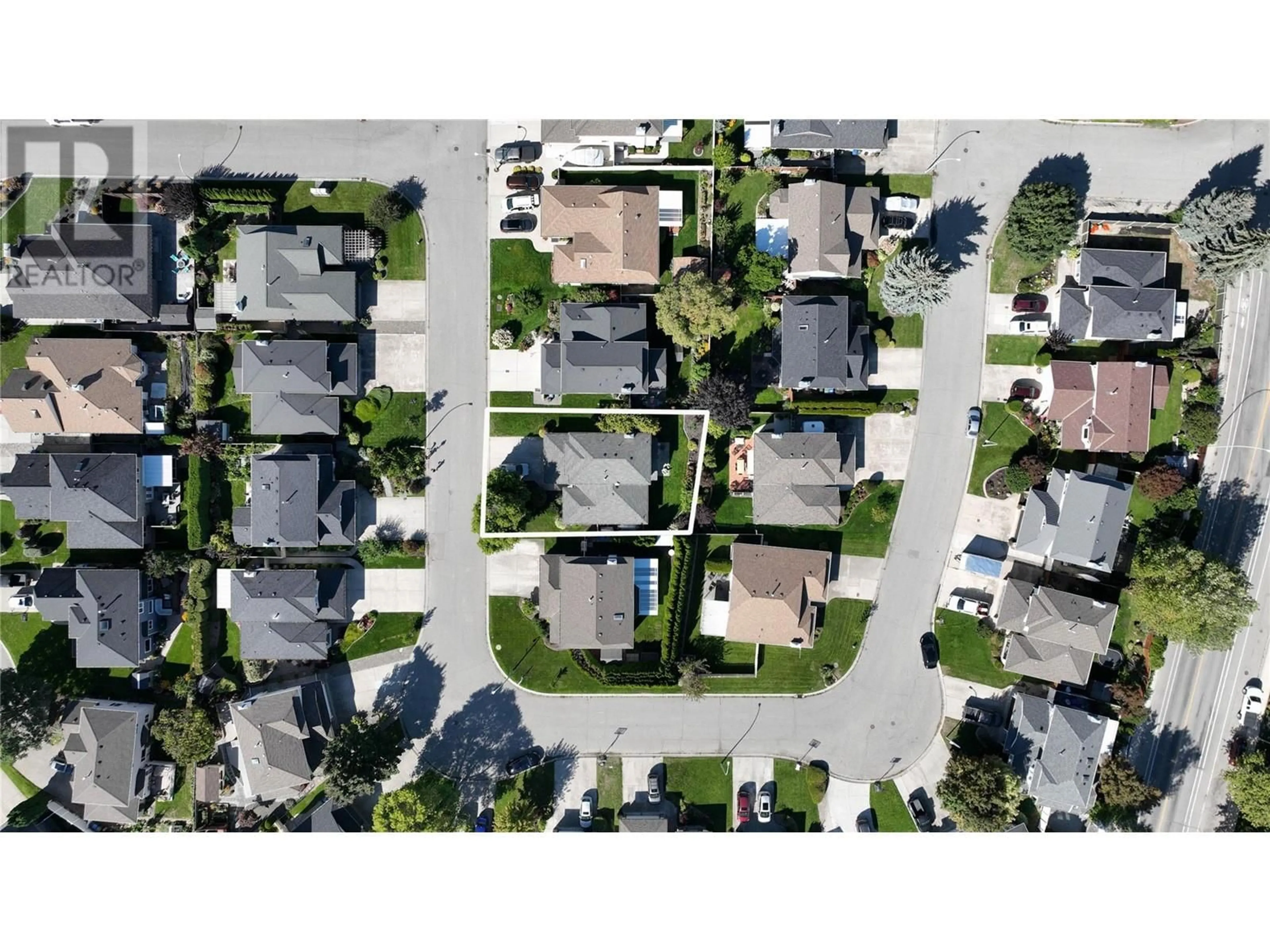 Frontside or backside of a home, the street view for 1132 WINTERGREEN Drive, Kelowna British Columbia V1W3V7