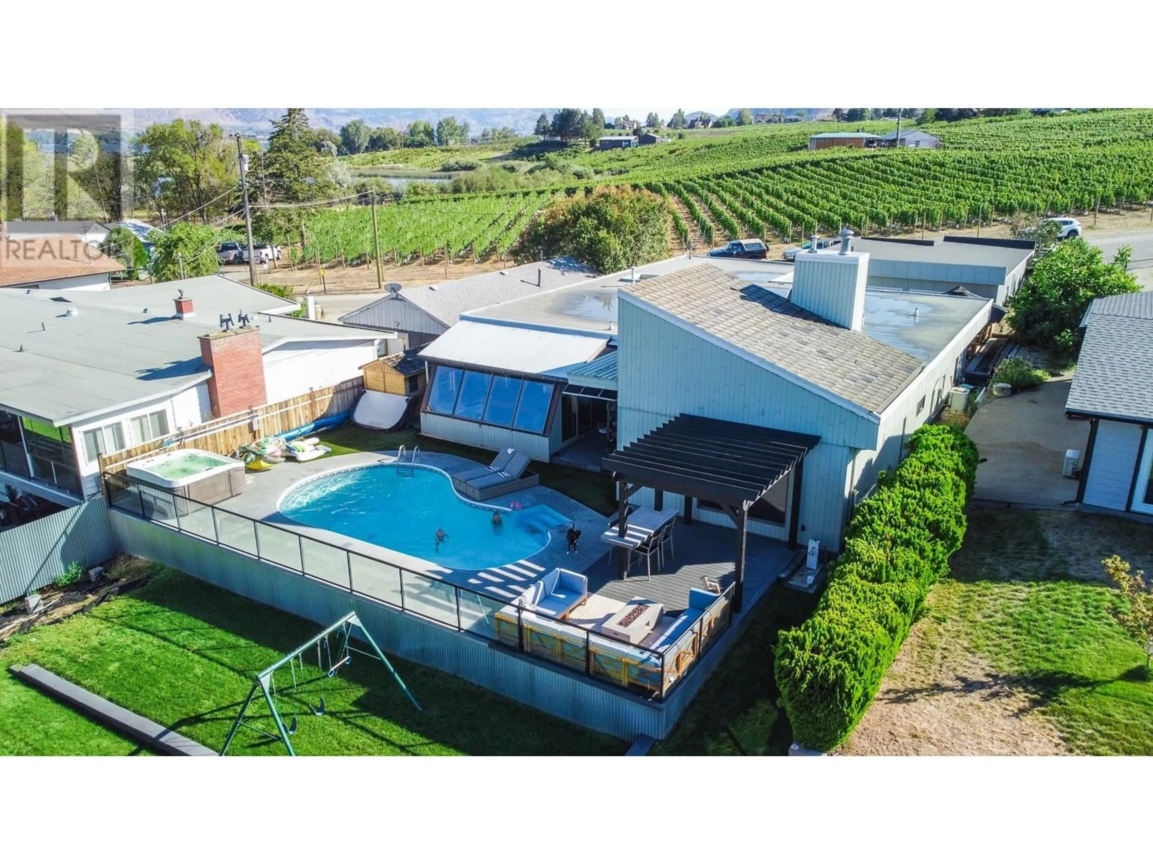 A pic from outside/outdoor area/front of a property/back of a property/a pic from drone, water/lake/river/ocean view for 8516 32ND AVENUE, Osoyoos British Columbia V0H1V1