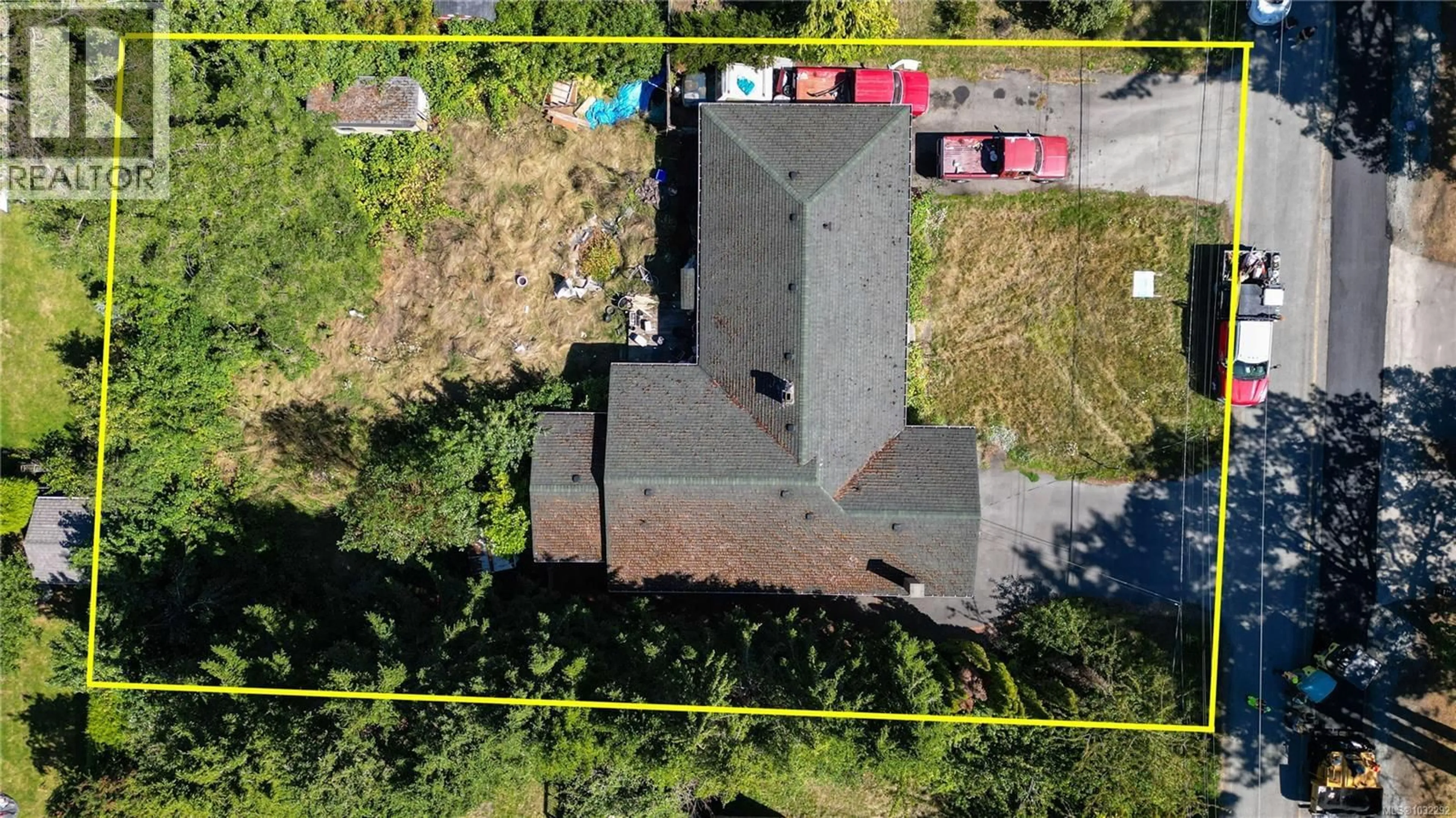 A pic from outside/outdoor area/front of a property/back of a property/a pic from drone, building for 1146 SLUGGETT ROAD, Central Saanich British Columbia V8M1E9