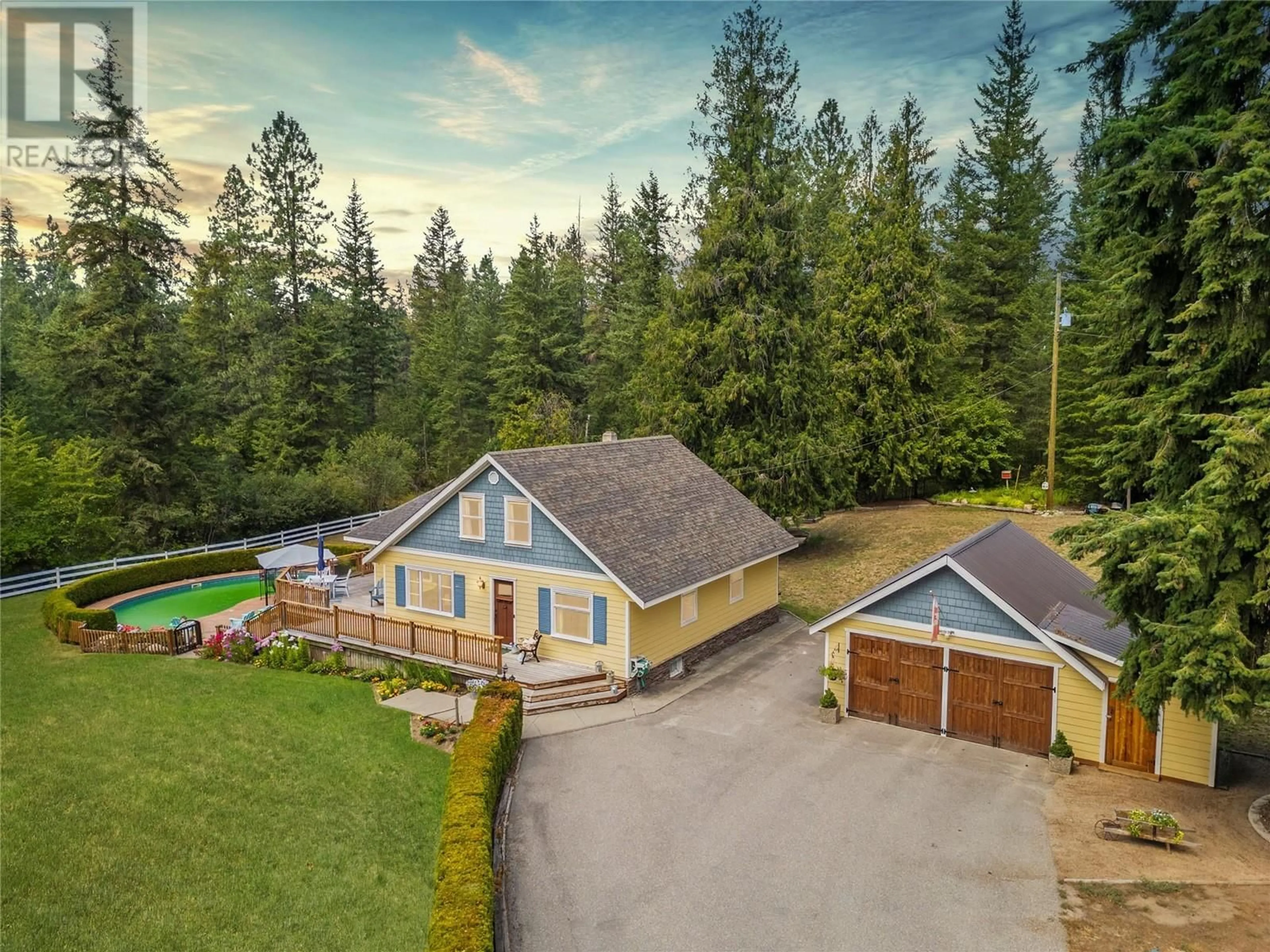 Frontside or backside of a home for 1560 Reservoir Road, Spallumcheen British Columbia V4Y0T4