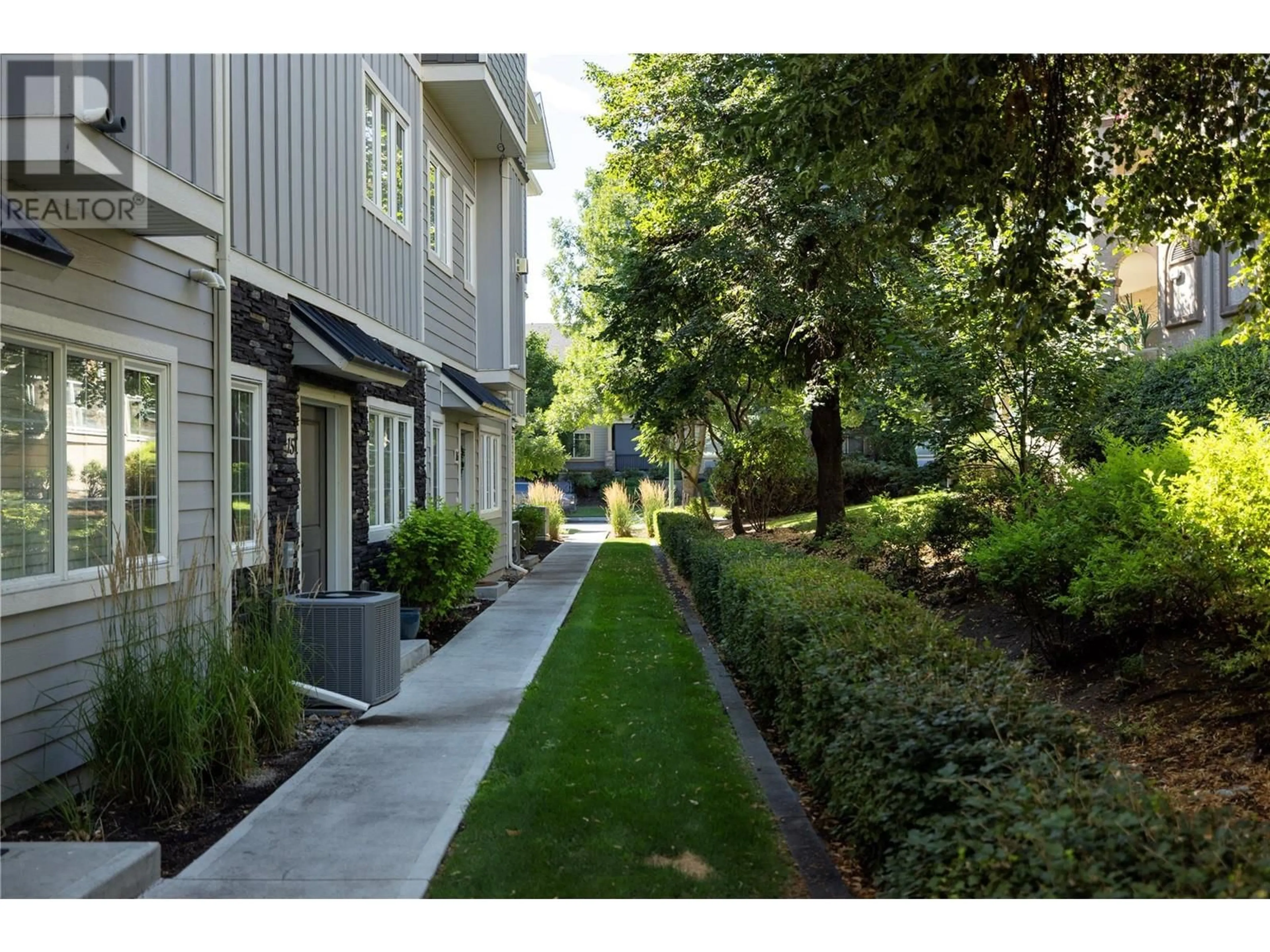 Patio, the fenced backyard for 644 Lequime Road Unit# 16, Kelowna British Columbia V1W1A4