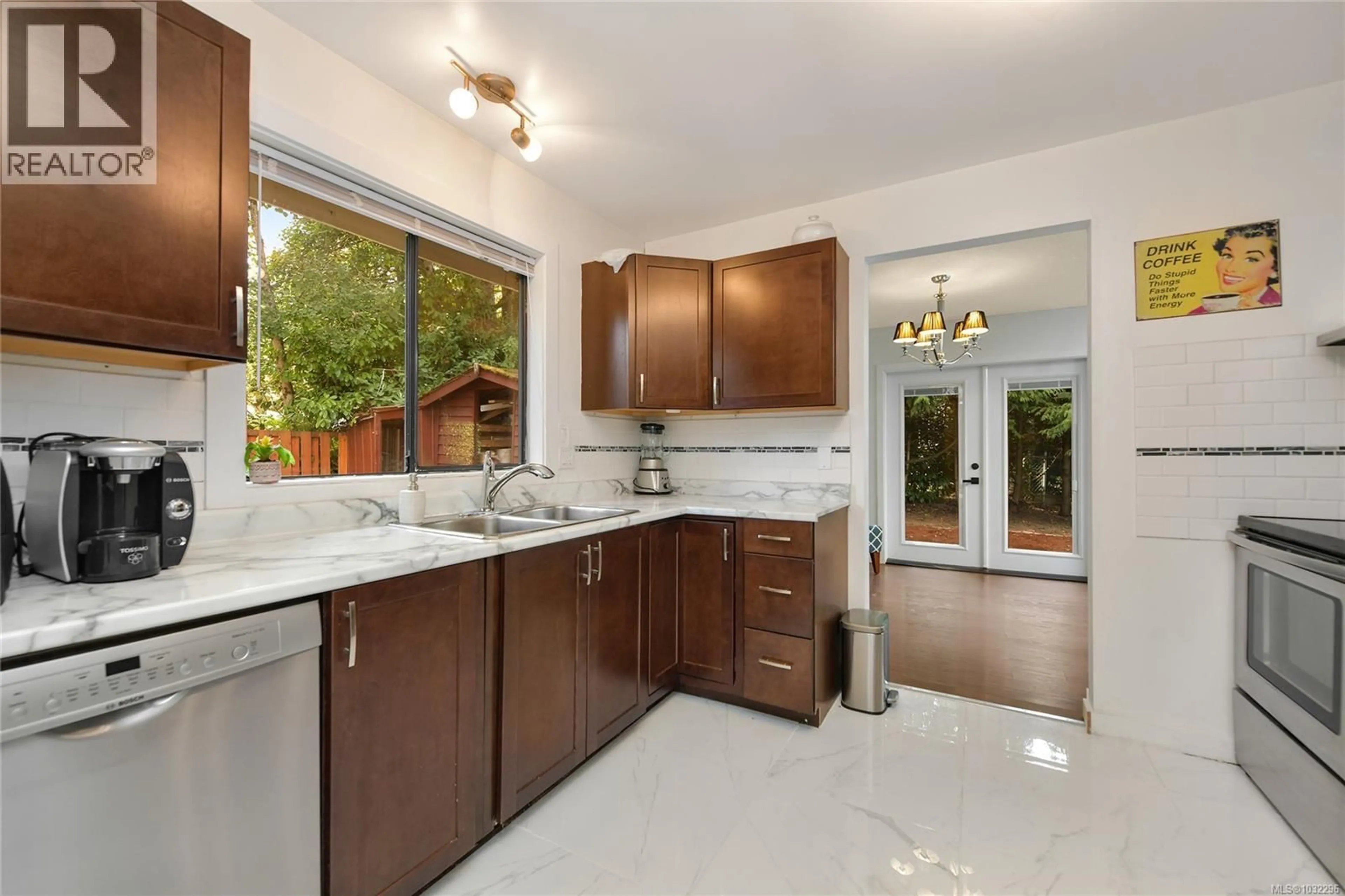 Open concept kitchen, ceramic/tile floor for 7037 WALLACE DRIVE, Central Saanich British Columbia V8M1E9