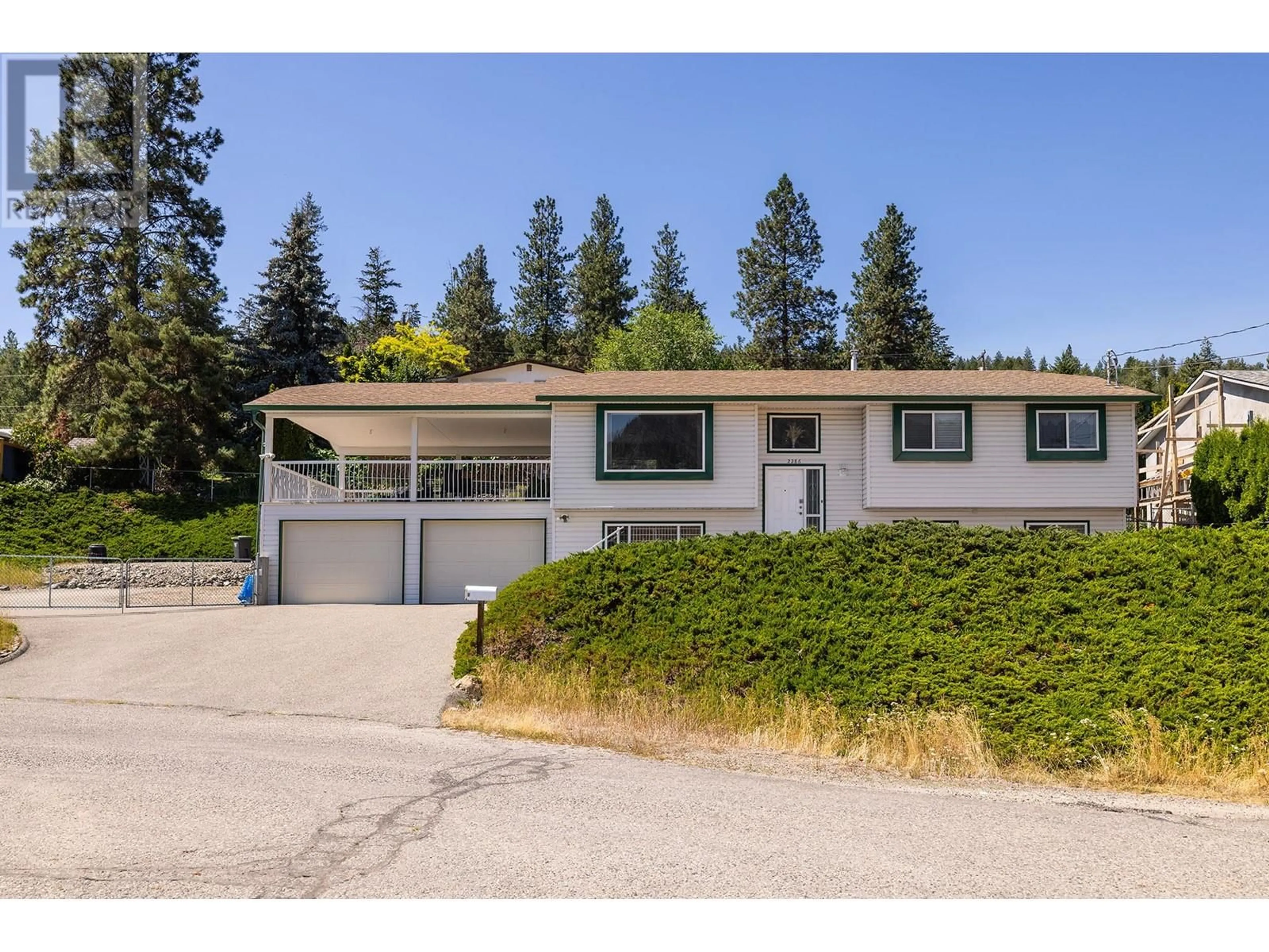 Frontside or backside of a home, cottage for 2286 Lynrick Road, Kelowna British Columbia V1P1G4