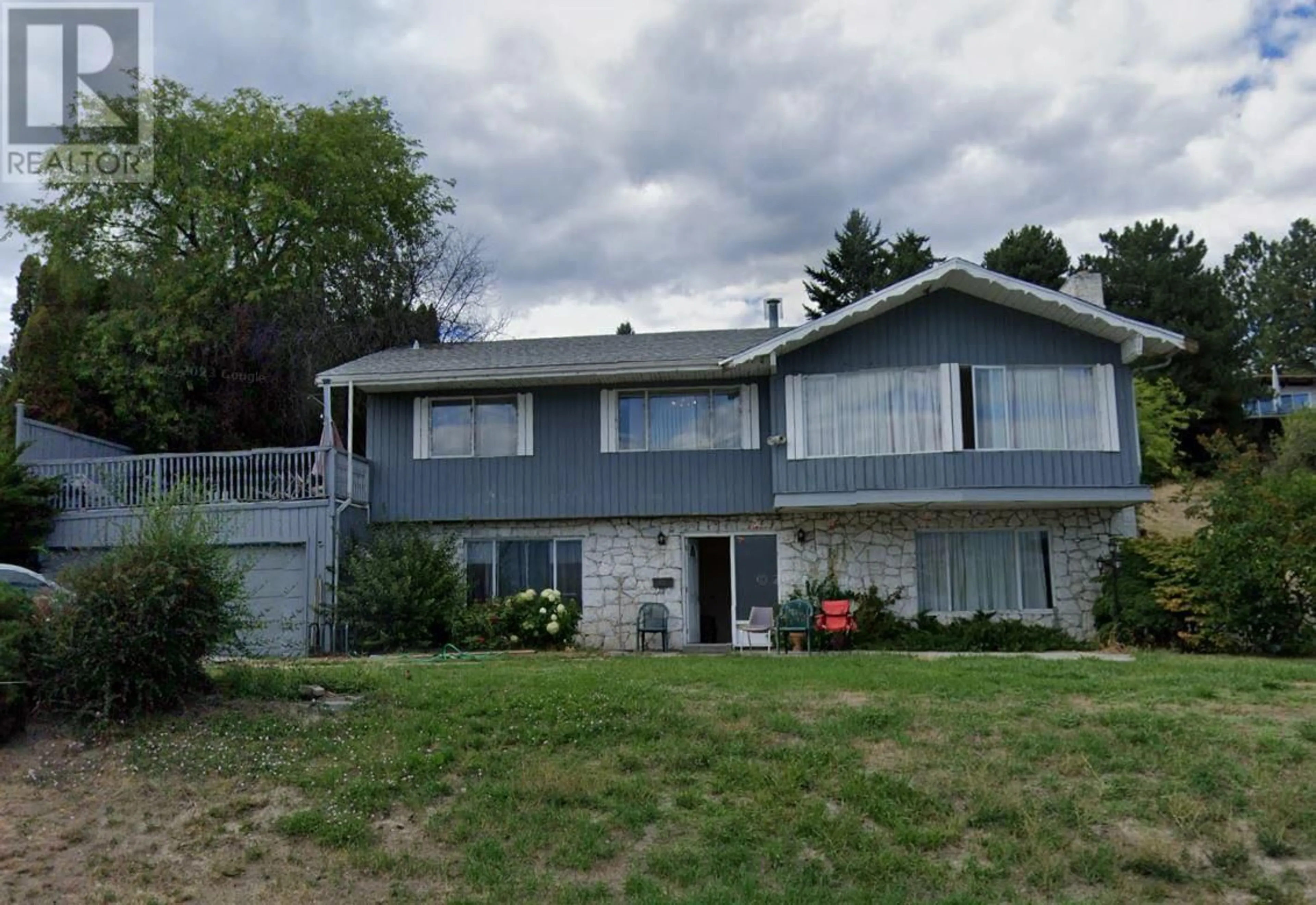 Frontside or backside of a home, the street view for 1040 Sunnyside Road, West Kelowna British Columbia V4T2N8