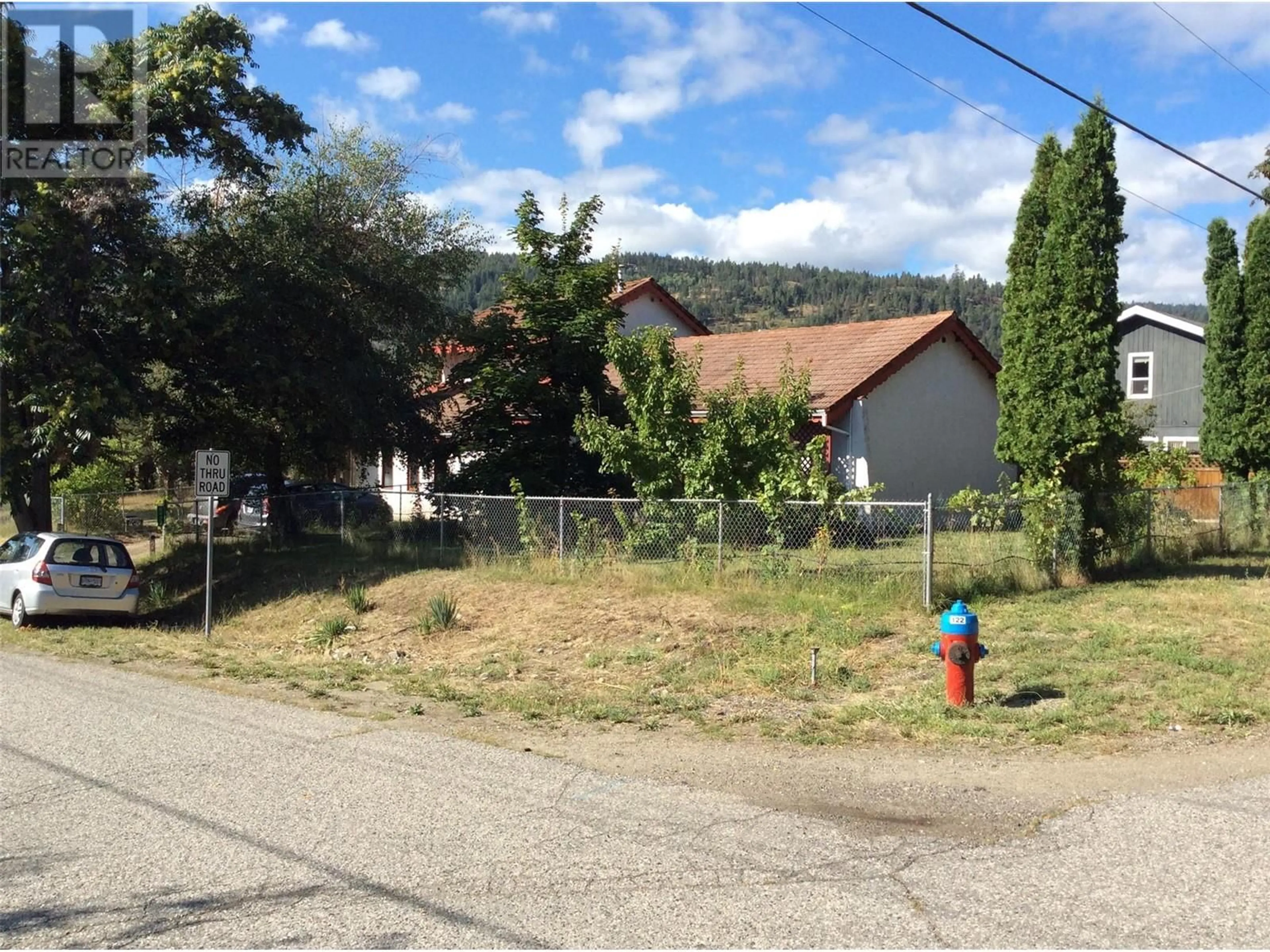 Frontside or backside of a home, the street view for 6422 Mack Road, Peachland British Columbia V0H1X8