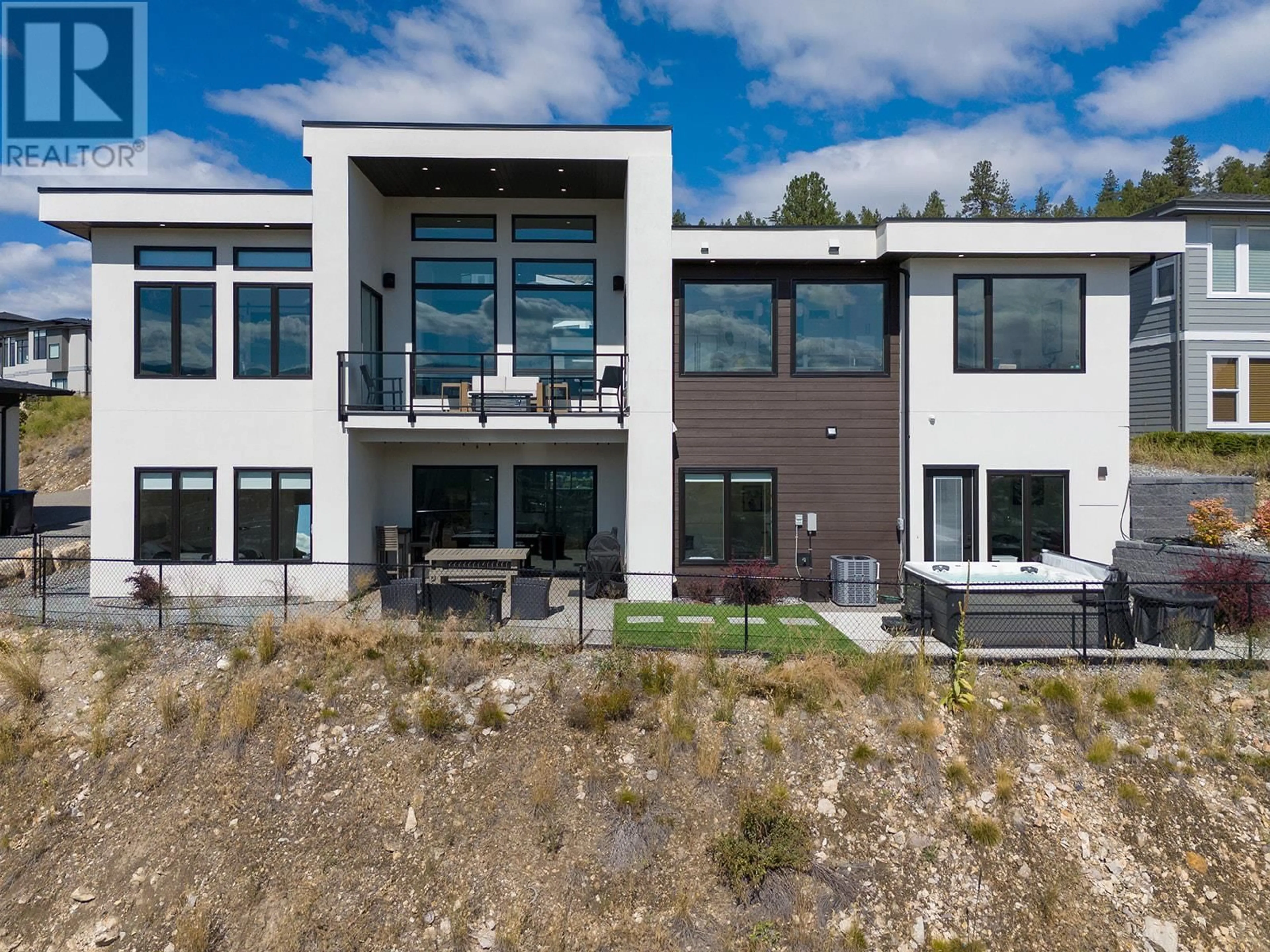 A pic from exterior of the house or condo, the front or back of building for 1426 Mine Hill Lane, Kelowna British Columbia V1P1T6