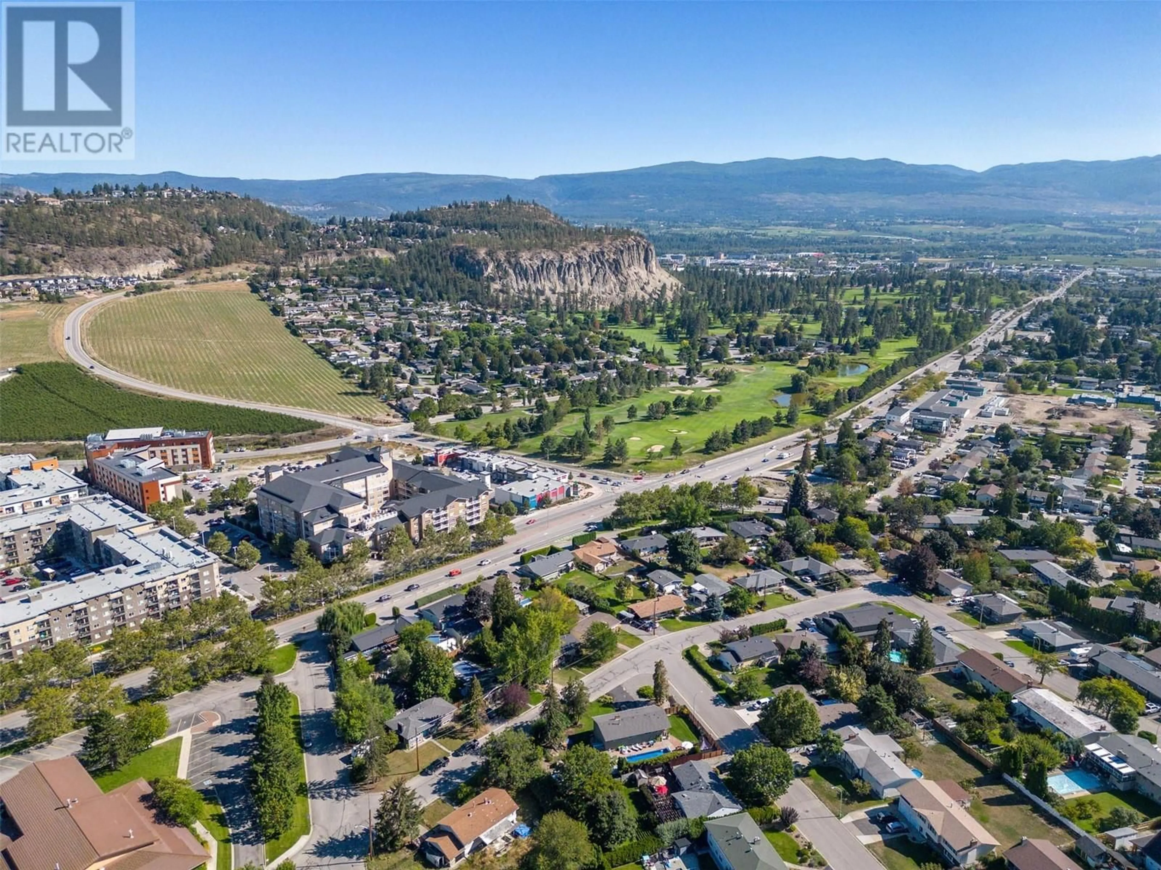 A pic from outside/outdoor area/front of a property/back of a property/a pic from drone, mountain view for 710 GLENMORE DRIVE, Kelowna British Columbia V1Y4N8