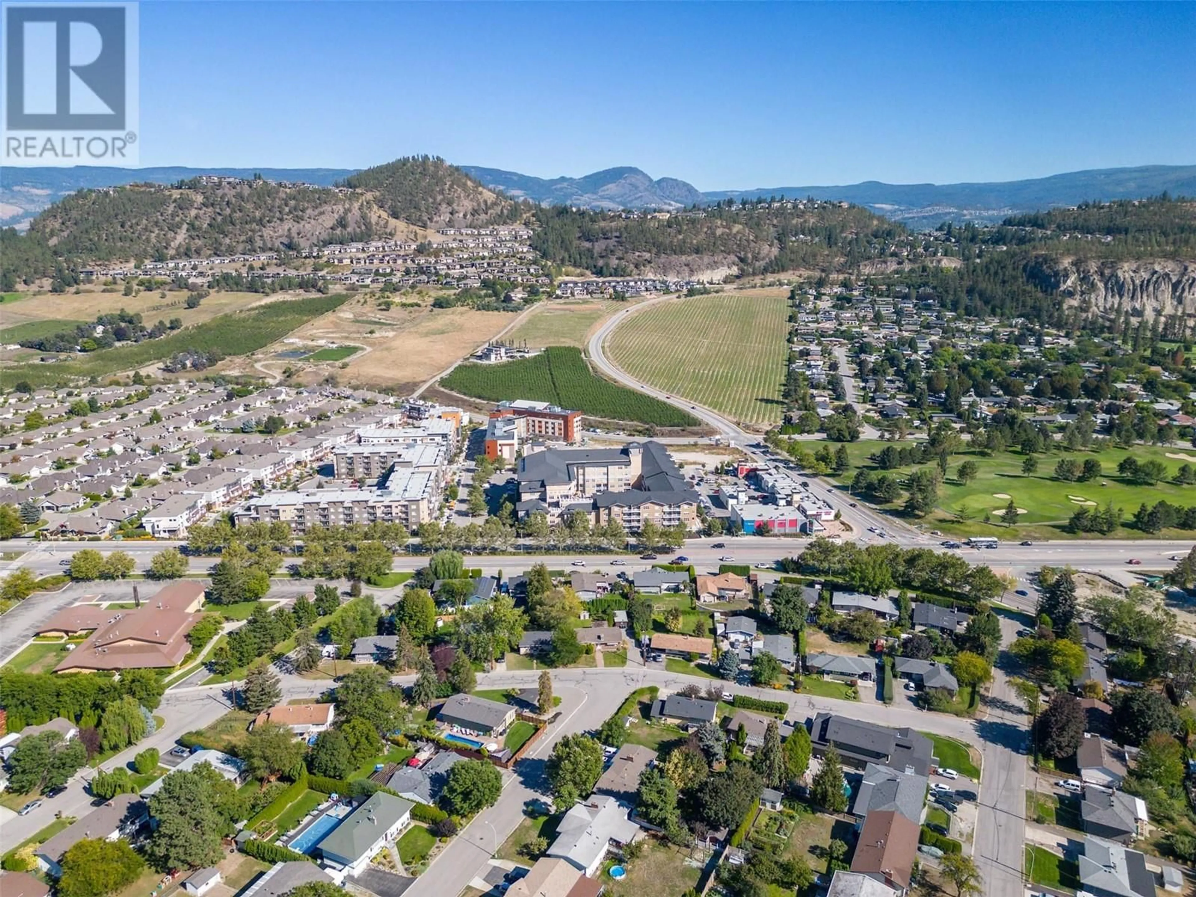 A pic from outside/outdoor area/front of a property/back of a property/a pic from drone, mountain view for 710 GLENMORE DRIVE, Kelowna British Columbia V1Y4N8