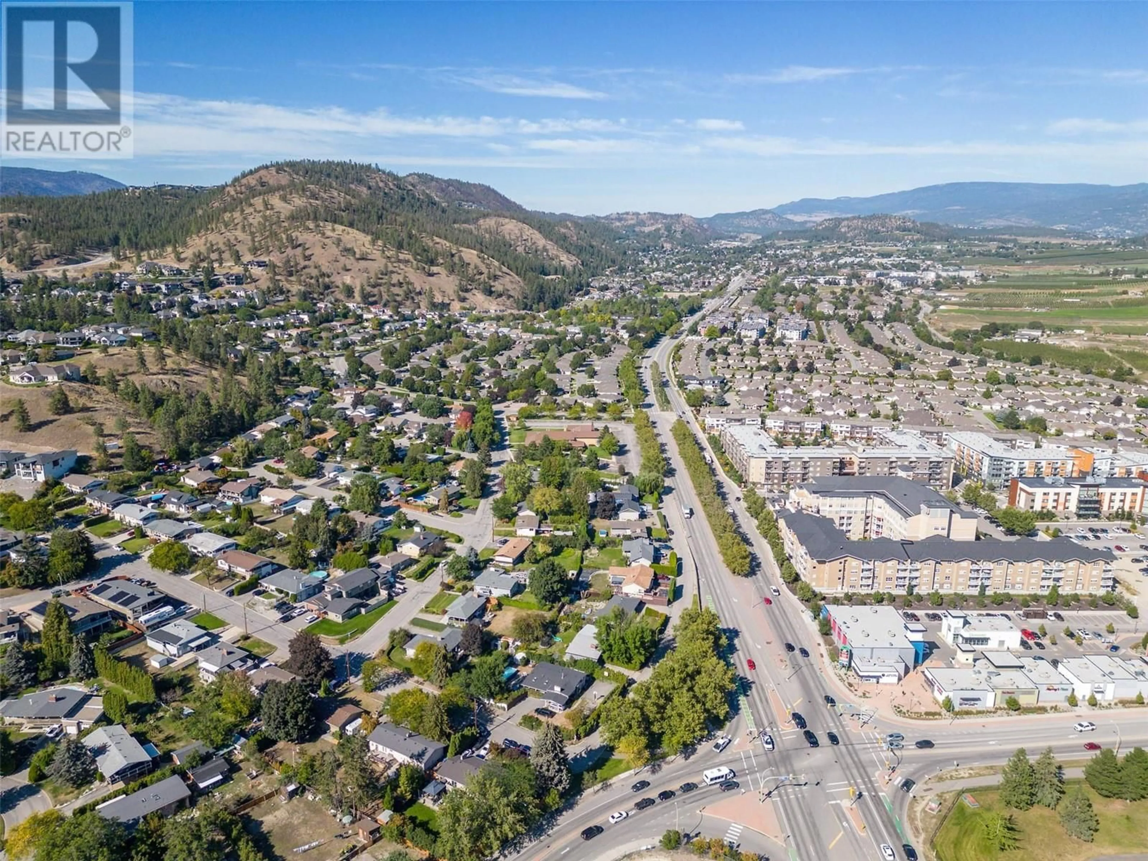 A pic from outside/outdoor area/front of a property/back of a property/a pic from drone, mountain view for 710 GLENMORE DRIVE, Kelowna British Columbia V1Y4N8