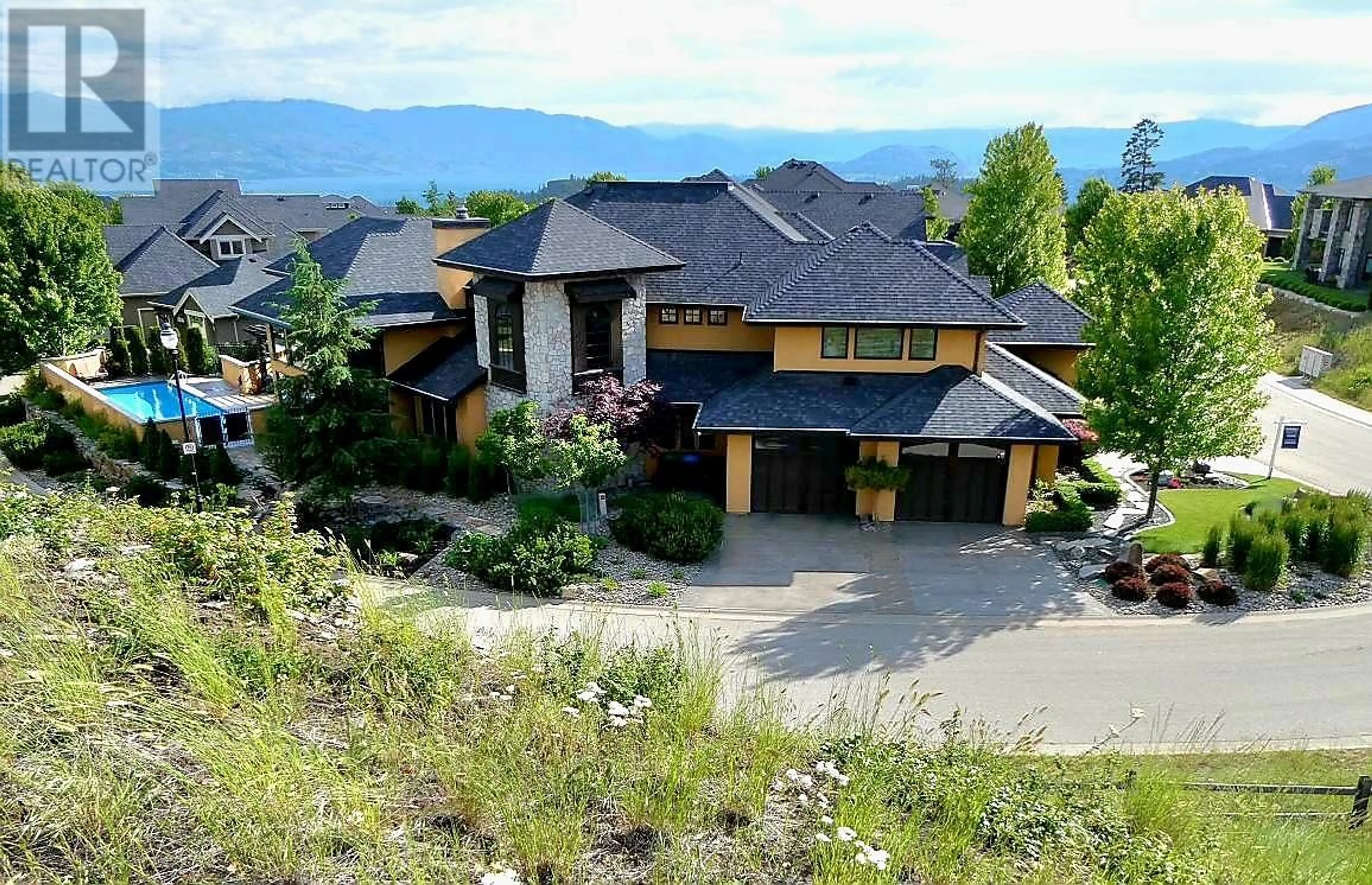 Frontside or backside of a home, mountain for 127 Skyland Drive, Kelowna British Columbia V1V3A2