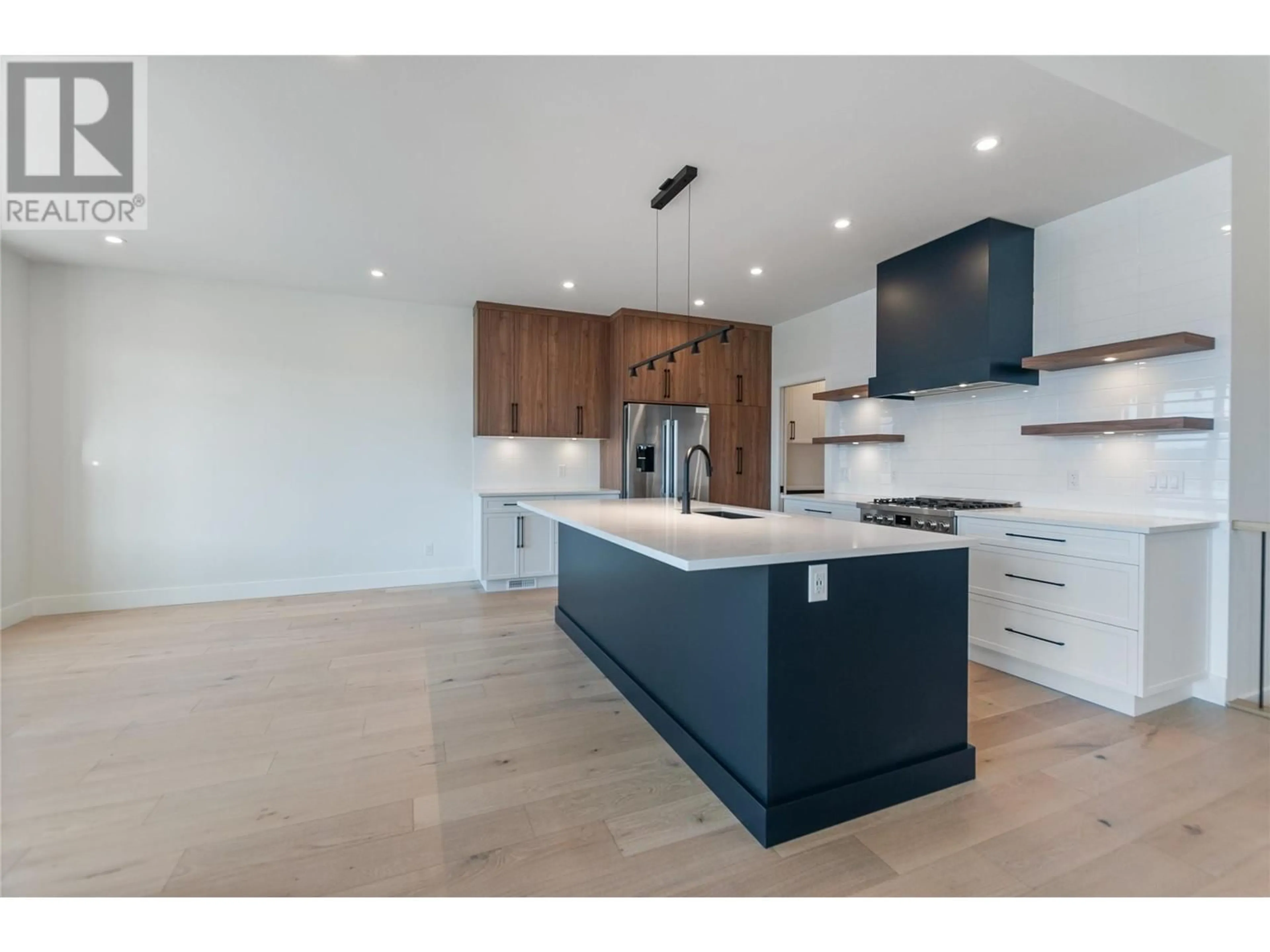 Open concept kitchen for 1143 Elk Street, Penticton British Columbia V2A0C9