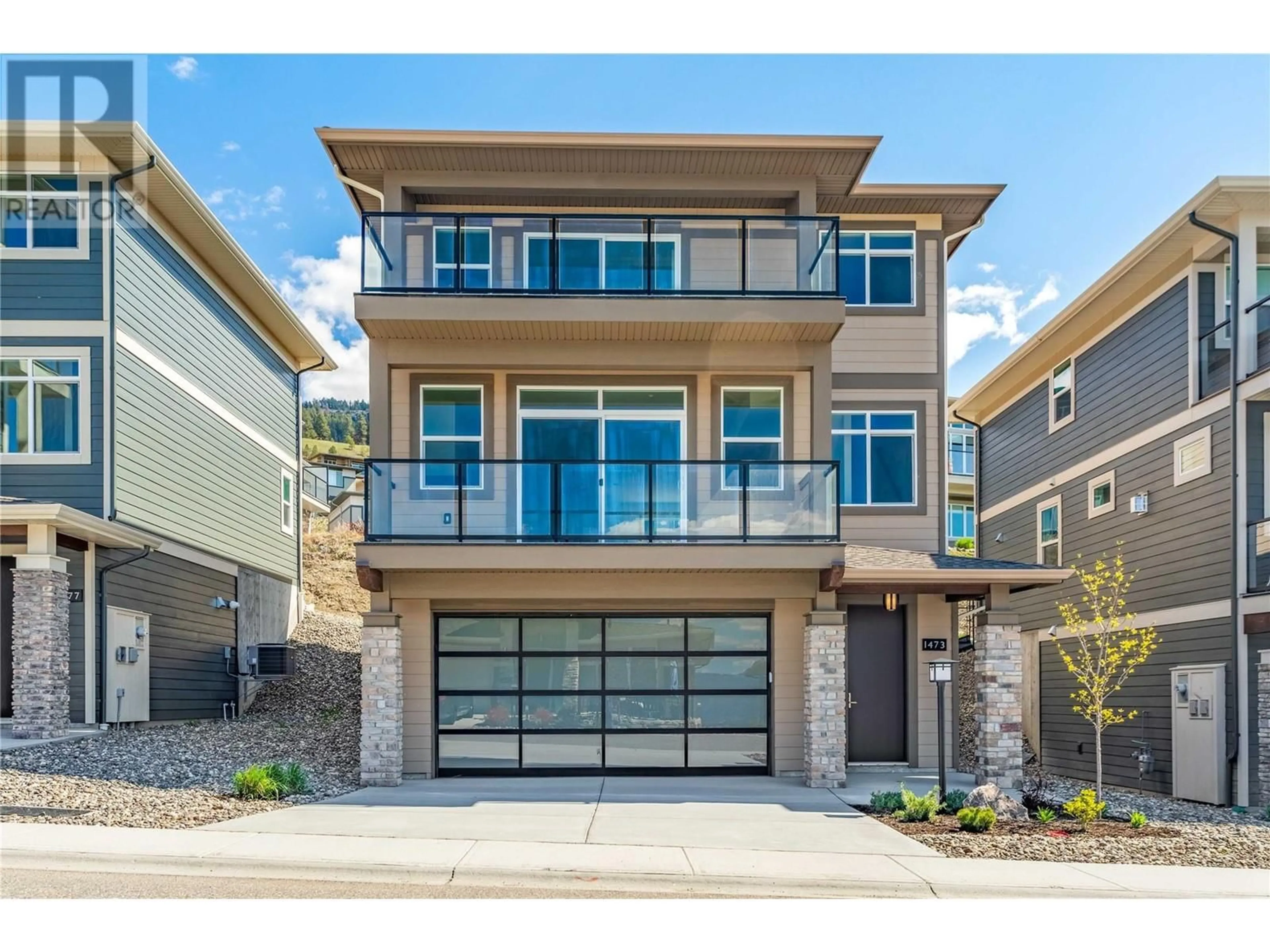 A pic from exterior of the house or condo for 1473 Tower Ranch Drive, Kelowna British Columbia V1P1T8