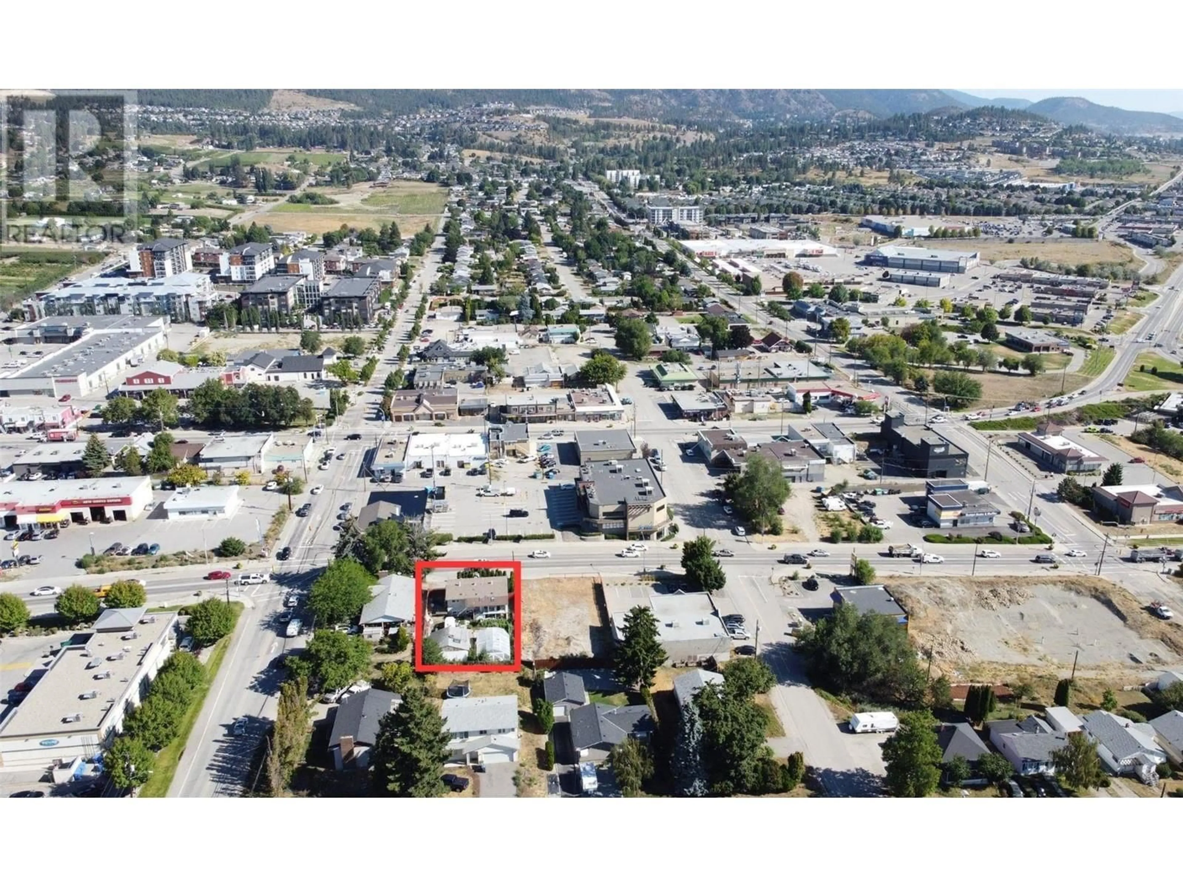 A pic from outside/outdoor area/front of a property/back of a property/a pic from drone, street for 2441 DOBBIN ROAD, West Kelowna British Columbia V4T1N6
