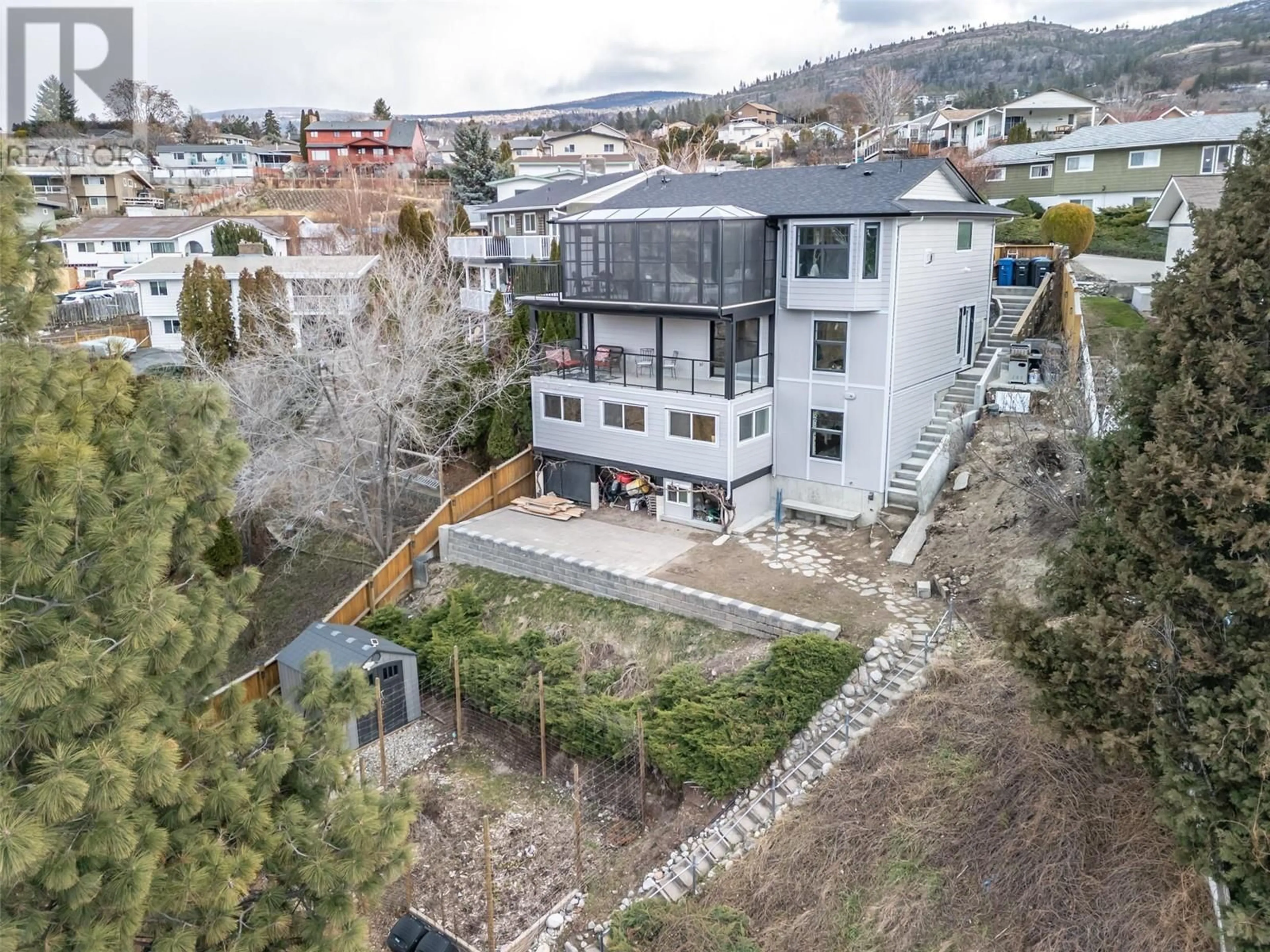 A pic from exterior of the house or condo, the street view for 57 Greenwood Drive, Penticton British Columbia V2A7P8