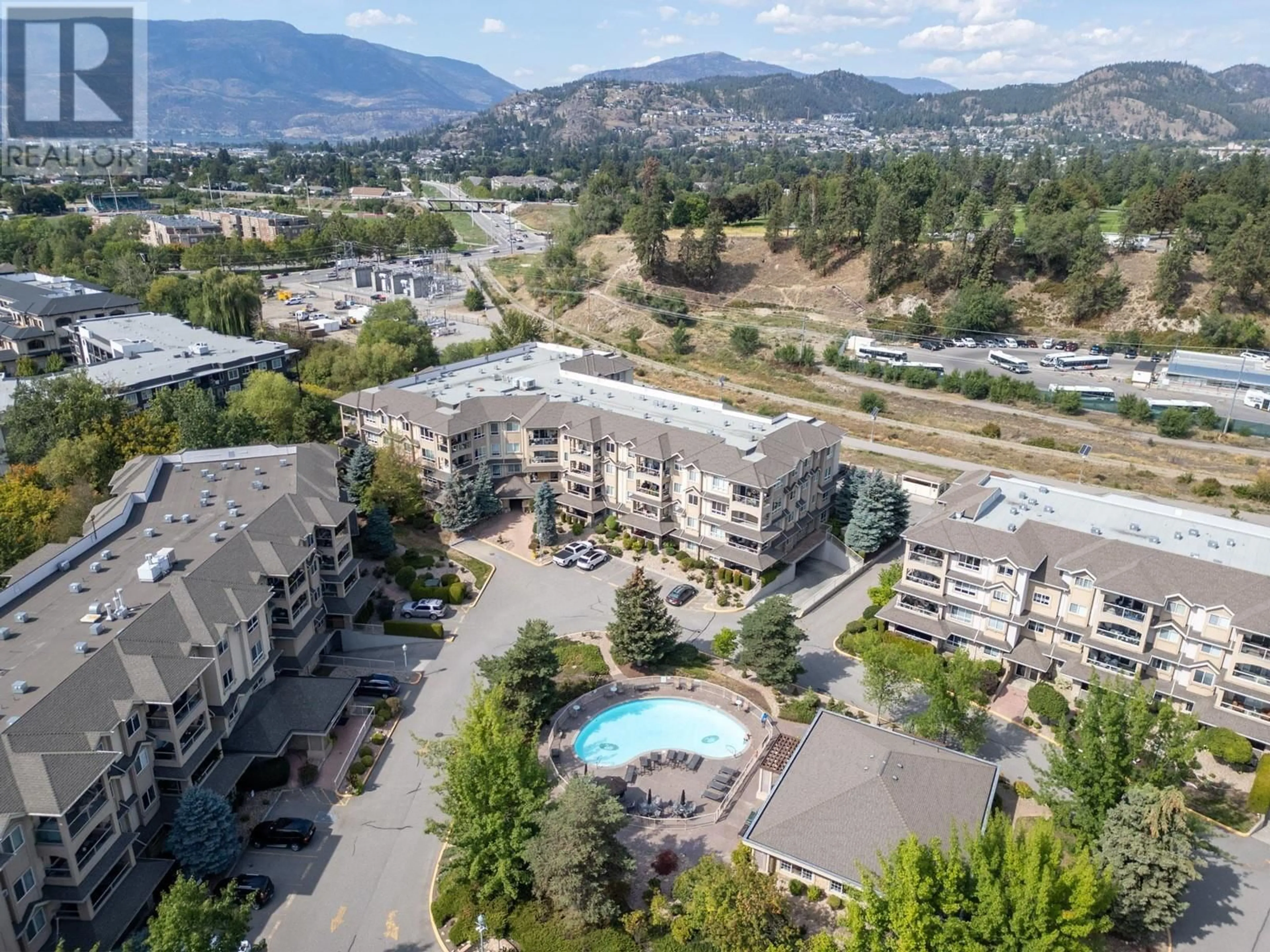 A pic from exterior of the house or condo, the view of mountain for 1962 Enterprise Way Unit# 411, Kelowna British Columbia V1Y9S6