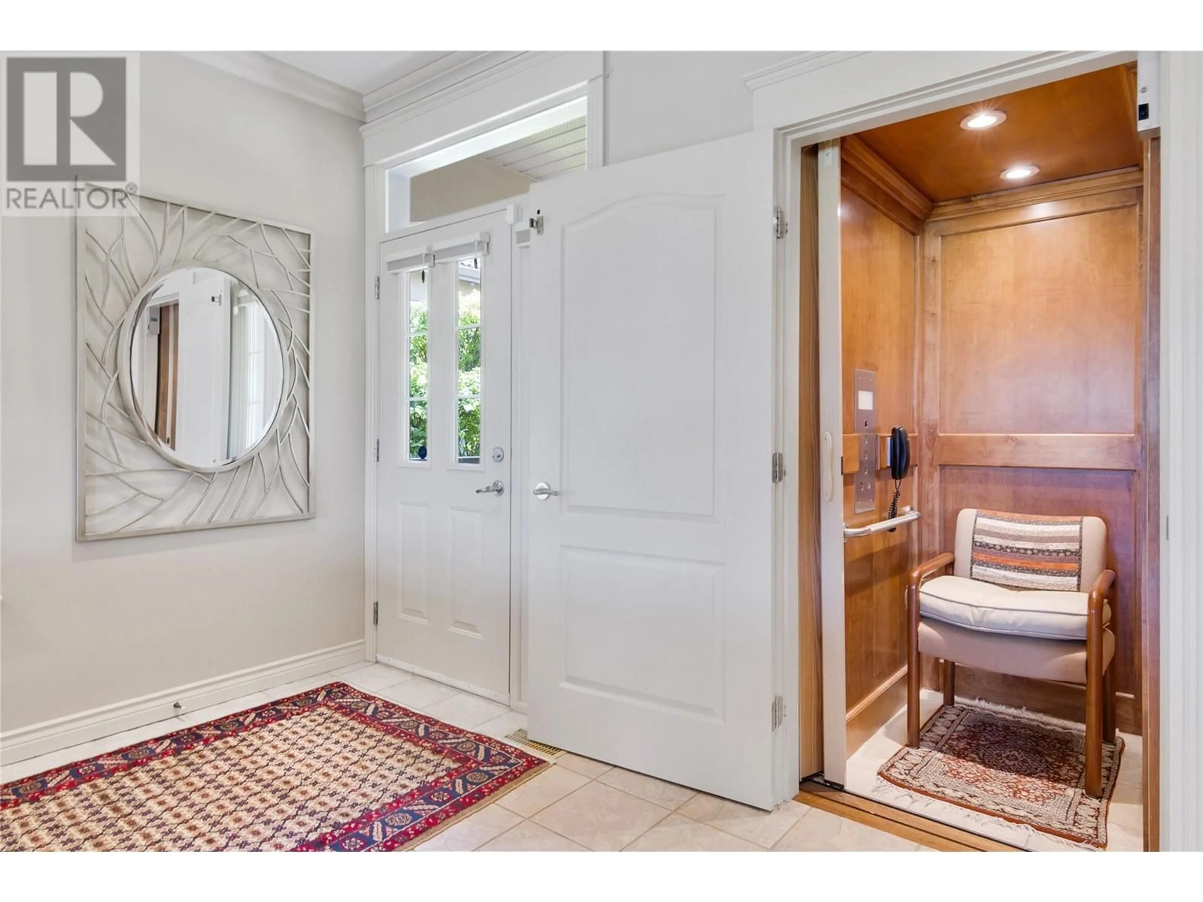 Indoor entryway, wood floors for 2259 Capistrano Drive, Kelowna British Columbia V1V2M9