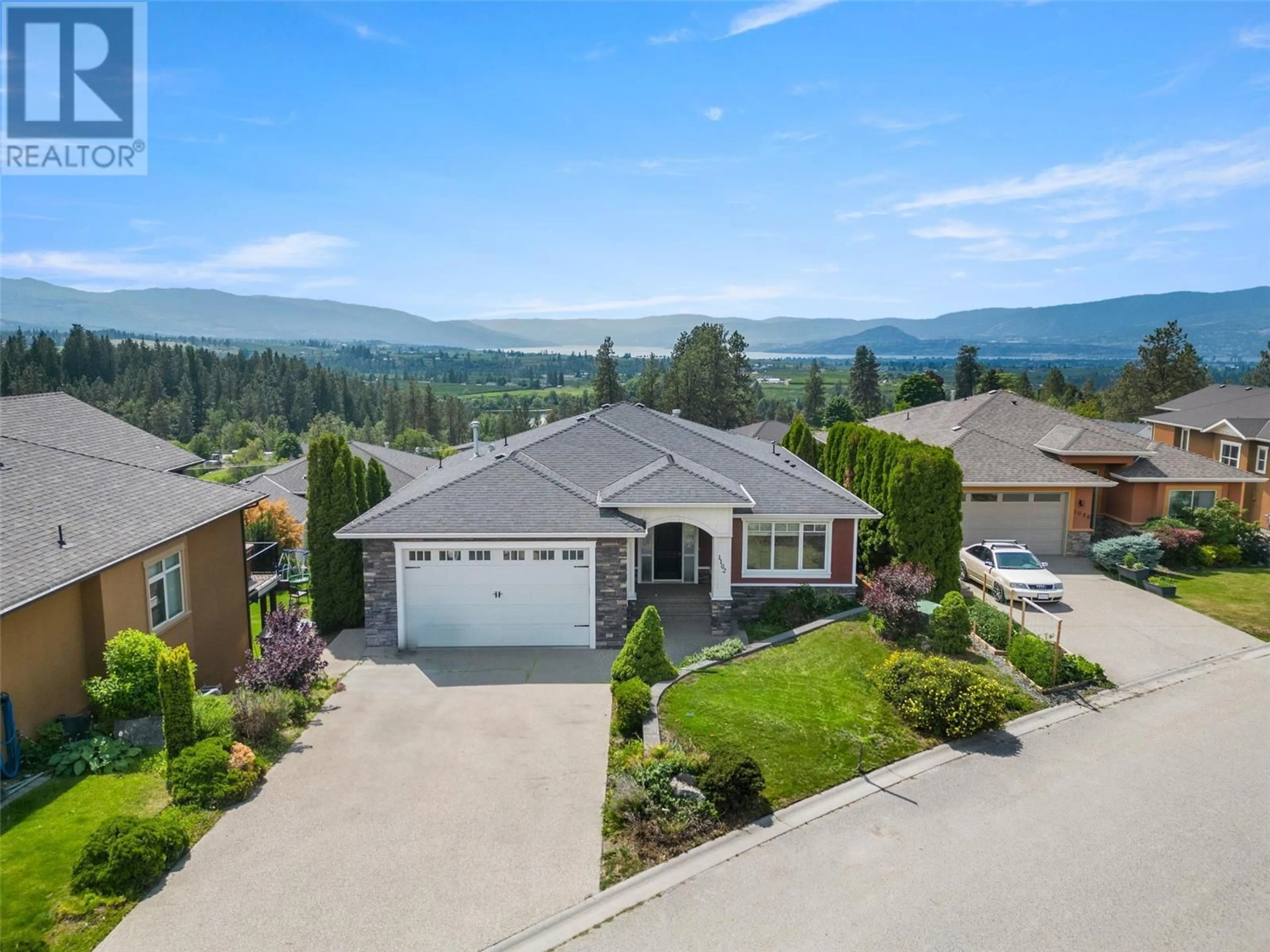 Frontside or backside of a home, the street view for 1102 Hume Avenue, Kelowna British Columbia V1P1P2