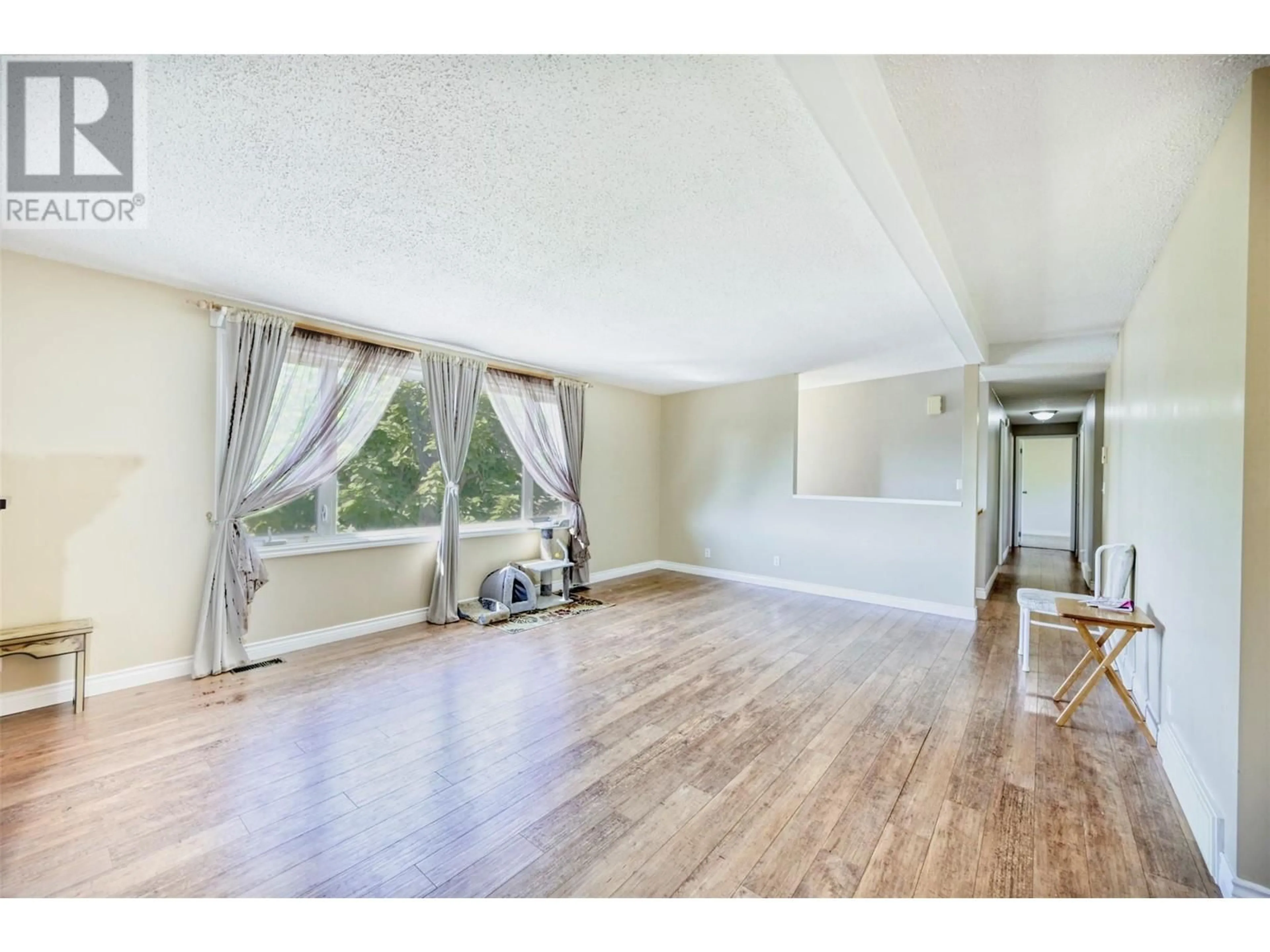 A pic of a room, wood floors for 8906 Jubilee Drive, Osoyoos British Columbia V0H1V2