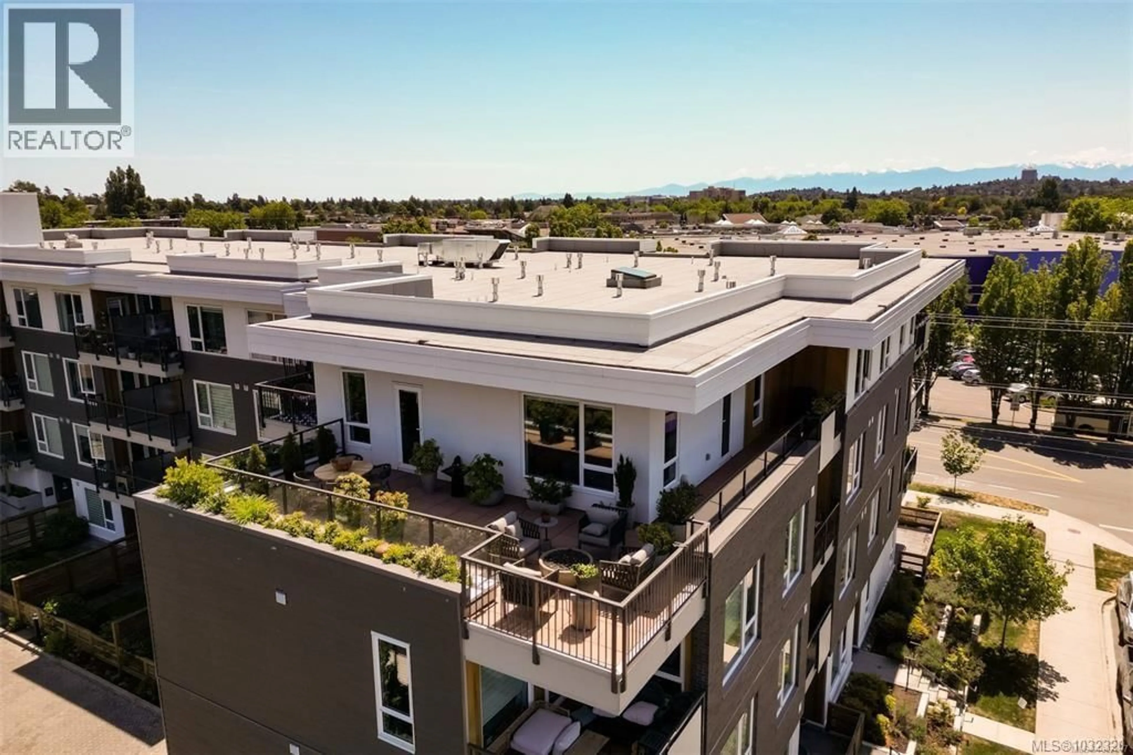 A pic from outside/outdoor area/front of a property/back of a property/a pic from drone, mountain view for 409 - 1588 NORTH DAIRY ROAD, Saanich British Columbia V8T3V4