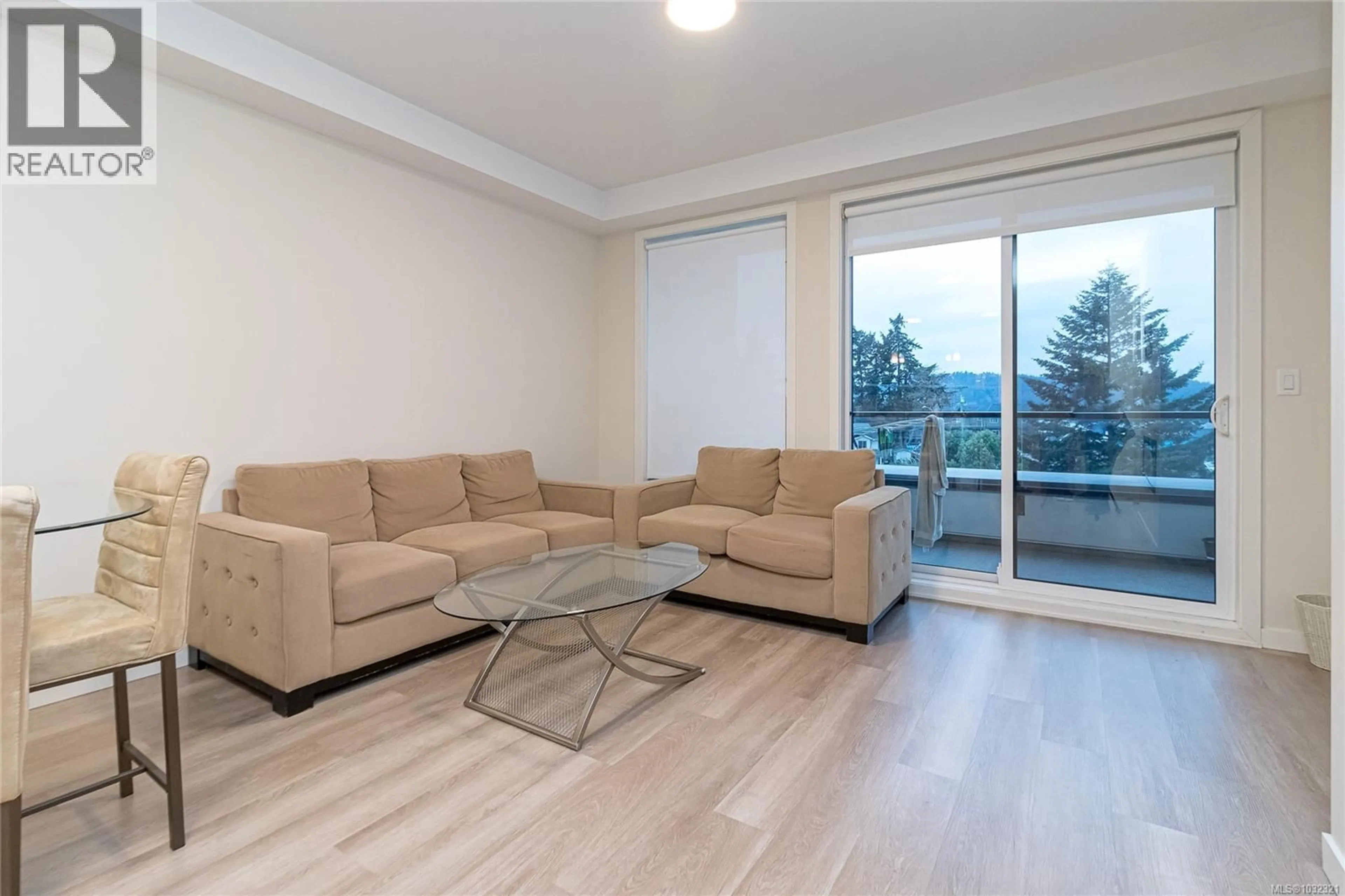 Living room with furniture, wood/laminate floor for 304 - 815 ORONO AVENUE, Langford British Columbia V9B2T9