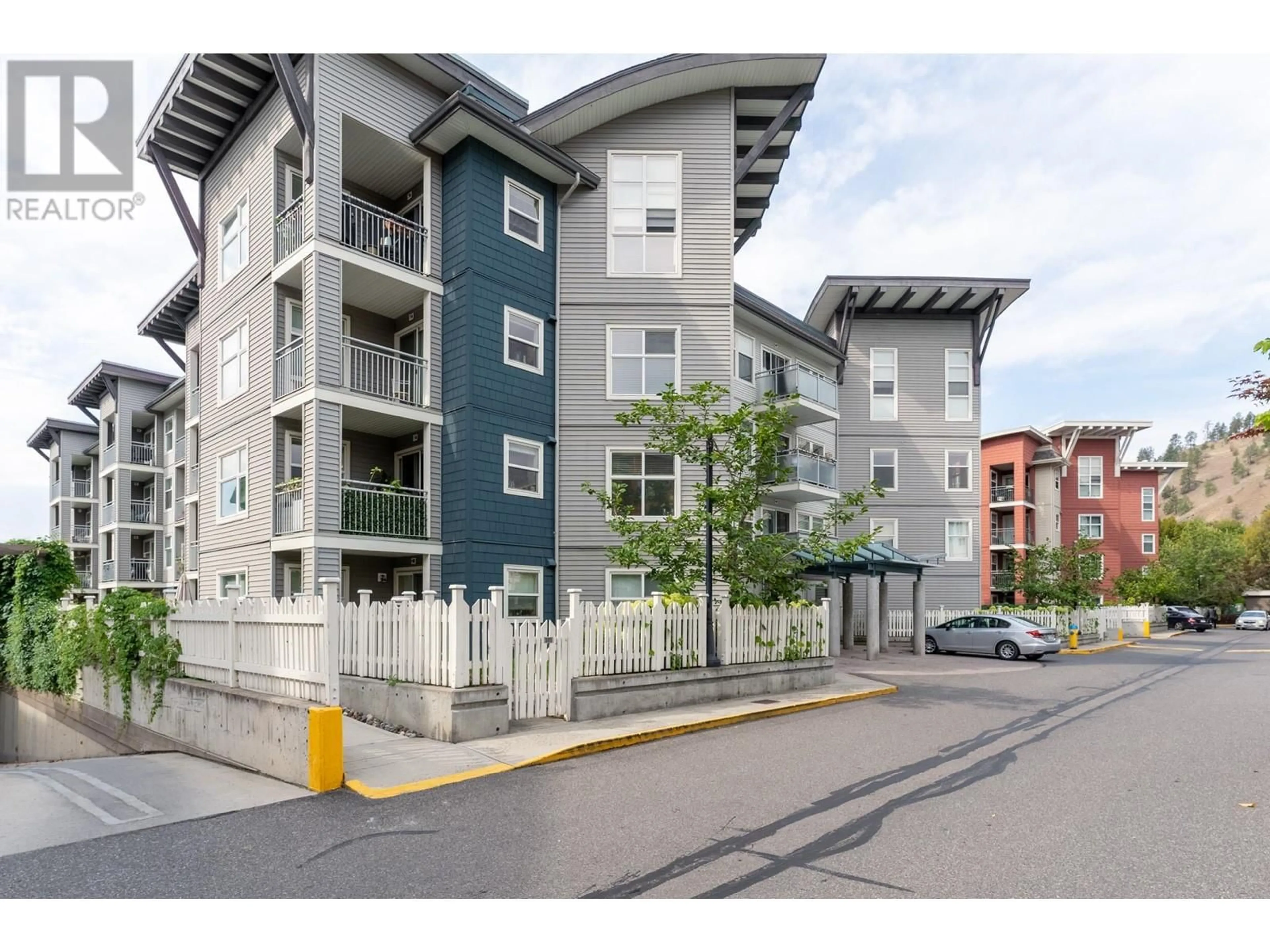 A pic from exterior of the house or condo, the front or back of building for 563 Yates Road Unit# 302, Kelowna British Columbia V1V2V3