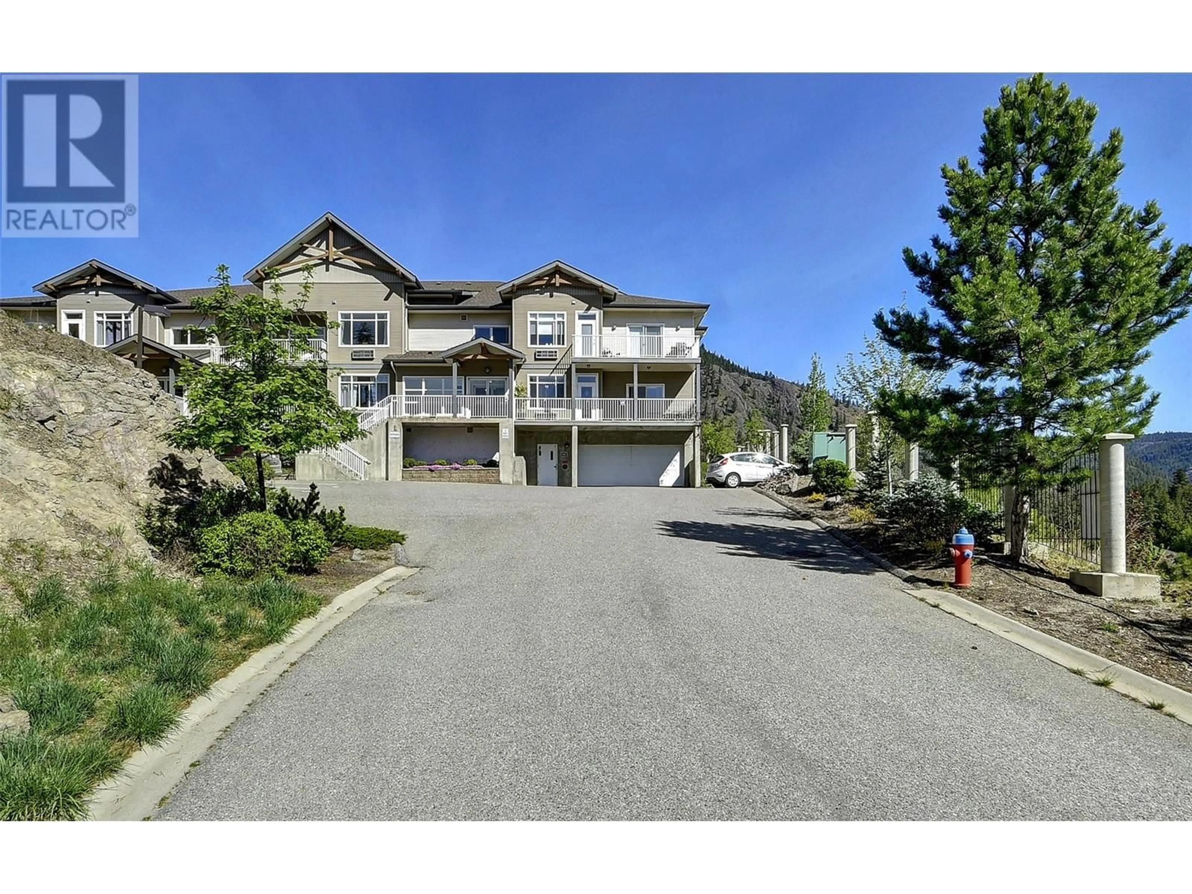 A pic from exterior of the house or condo, the street view for 2523 Shannon View Drive Unit# 106, West Kelowna British Columbia V4T2T3