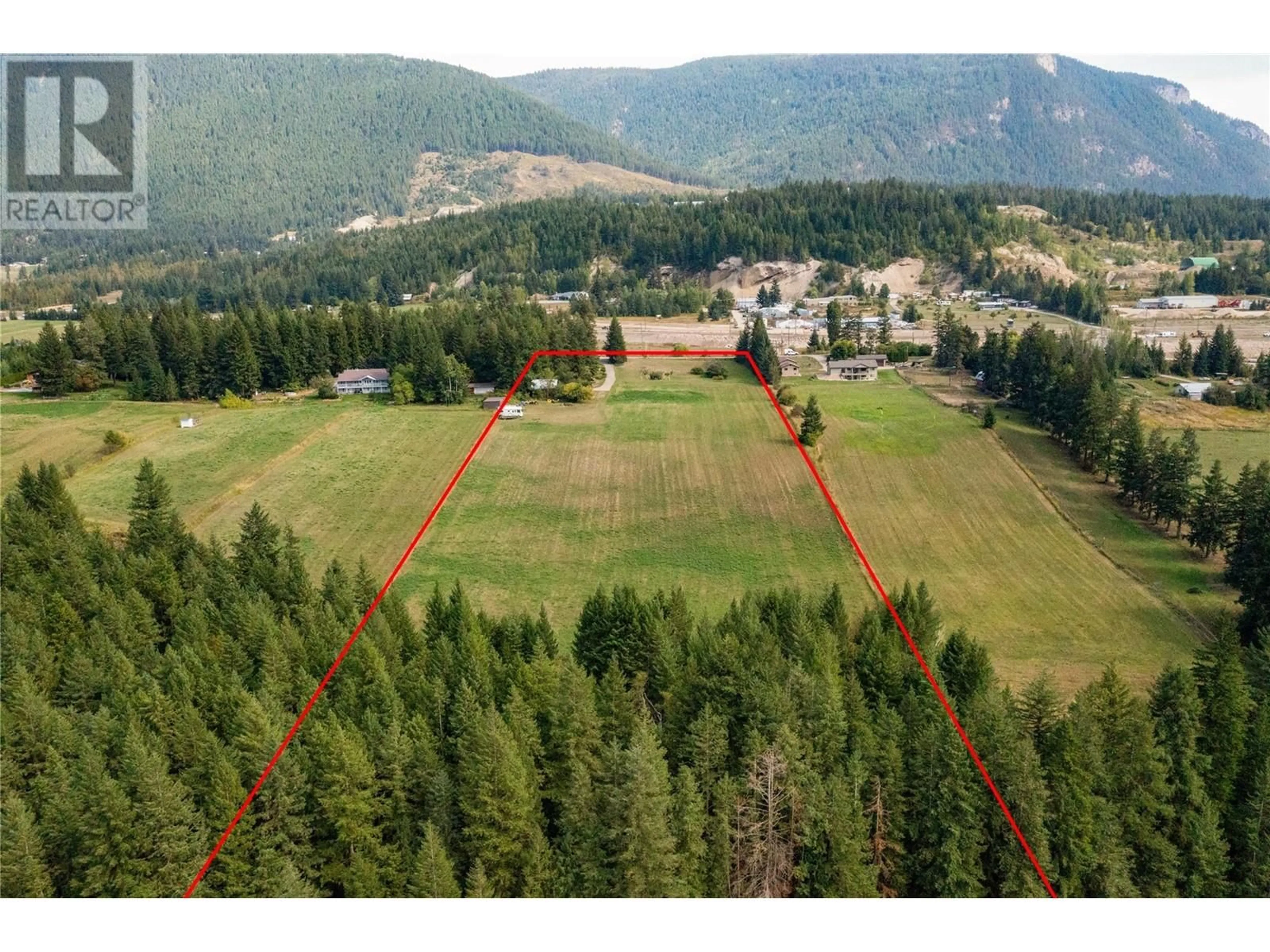 A pic from outside/outdoor area/front of a property/back of a property/a pic from drone, mountain view for 1195 Kirkpatrick Road, Tappen British Columbia V0E2X2