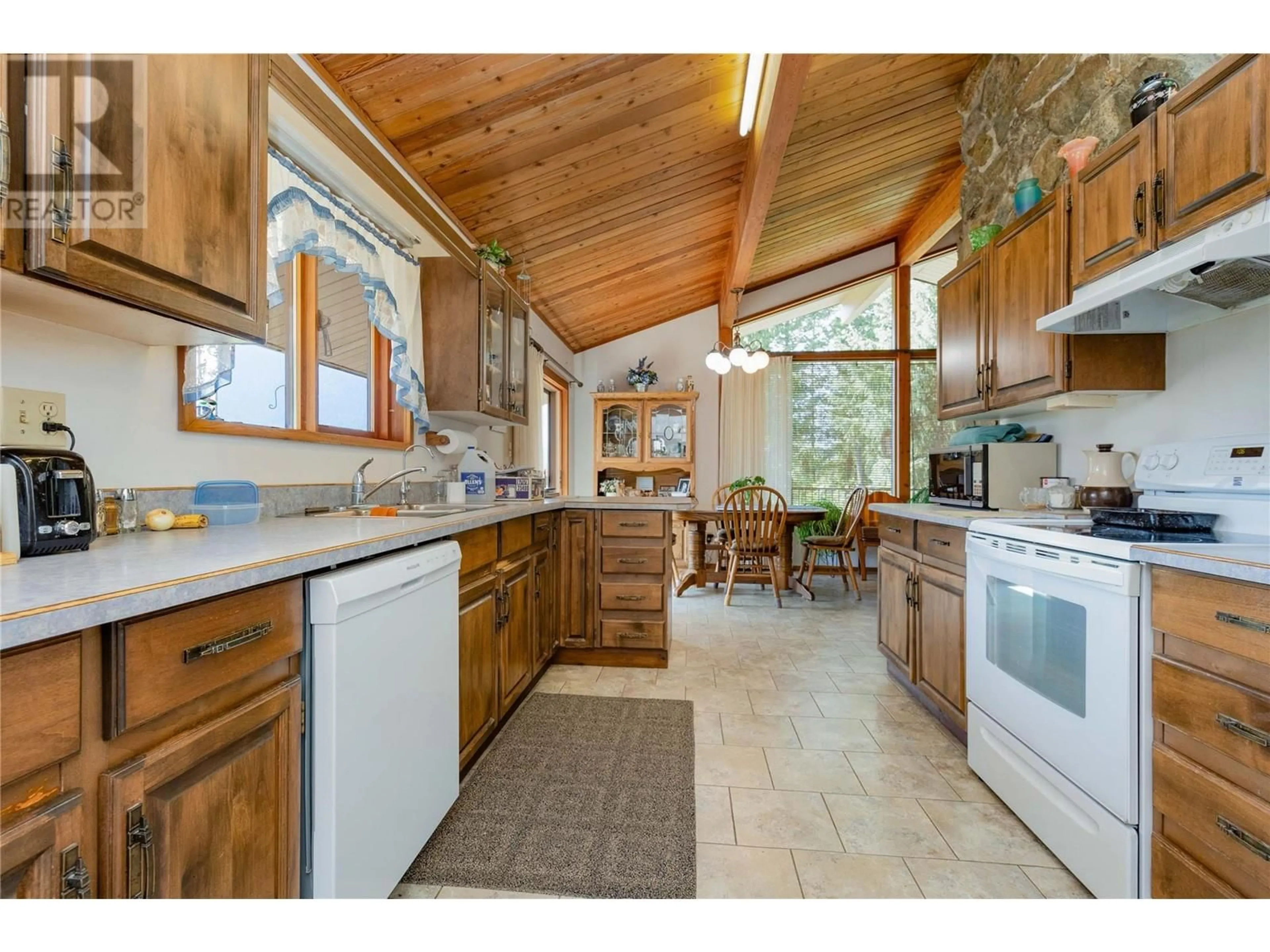 Open concept kitchen, ceramic/tile floor for 1195 Kirkpatrick Road, Tappen British Columbia V0E2X2