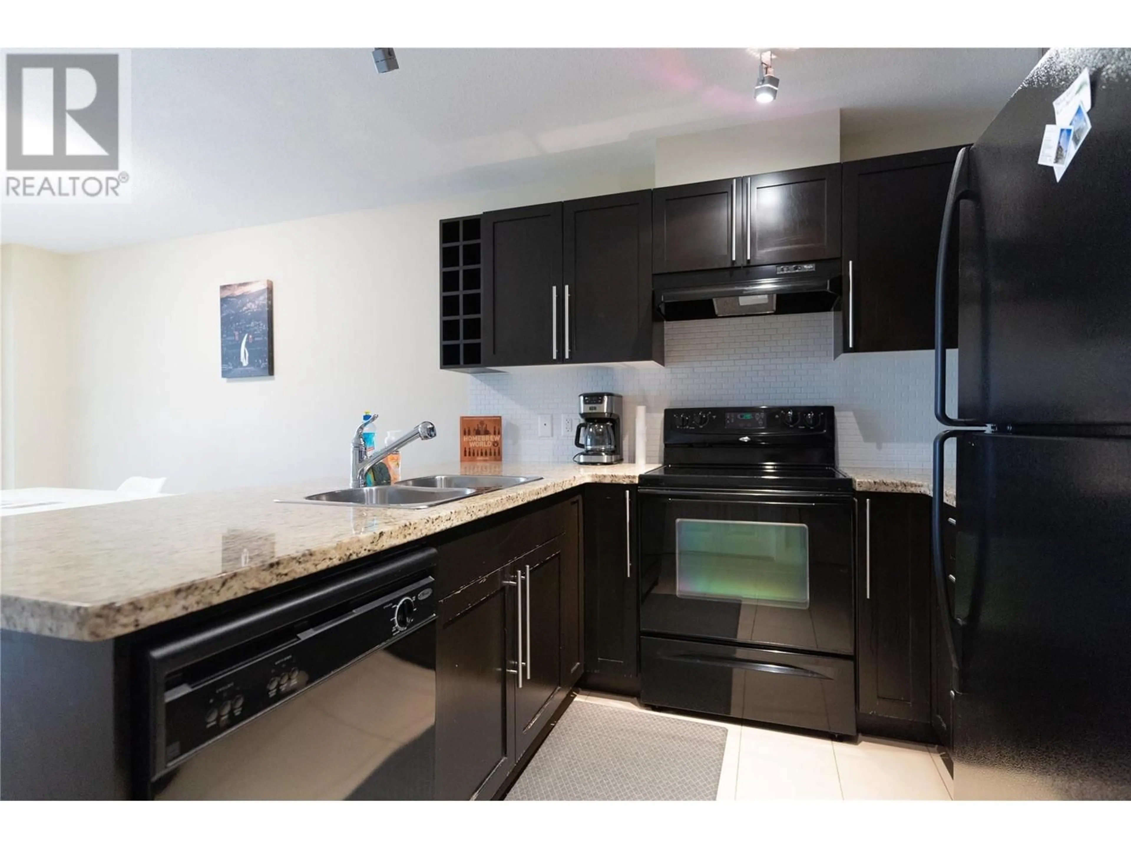 Standard kitchen, ceramic/tile floor for 1093 Sunset Drive Unit# 310, Kelowna British Columbia V1Y9Z4