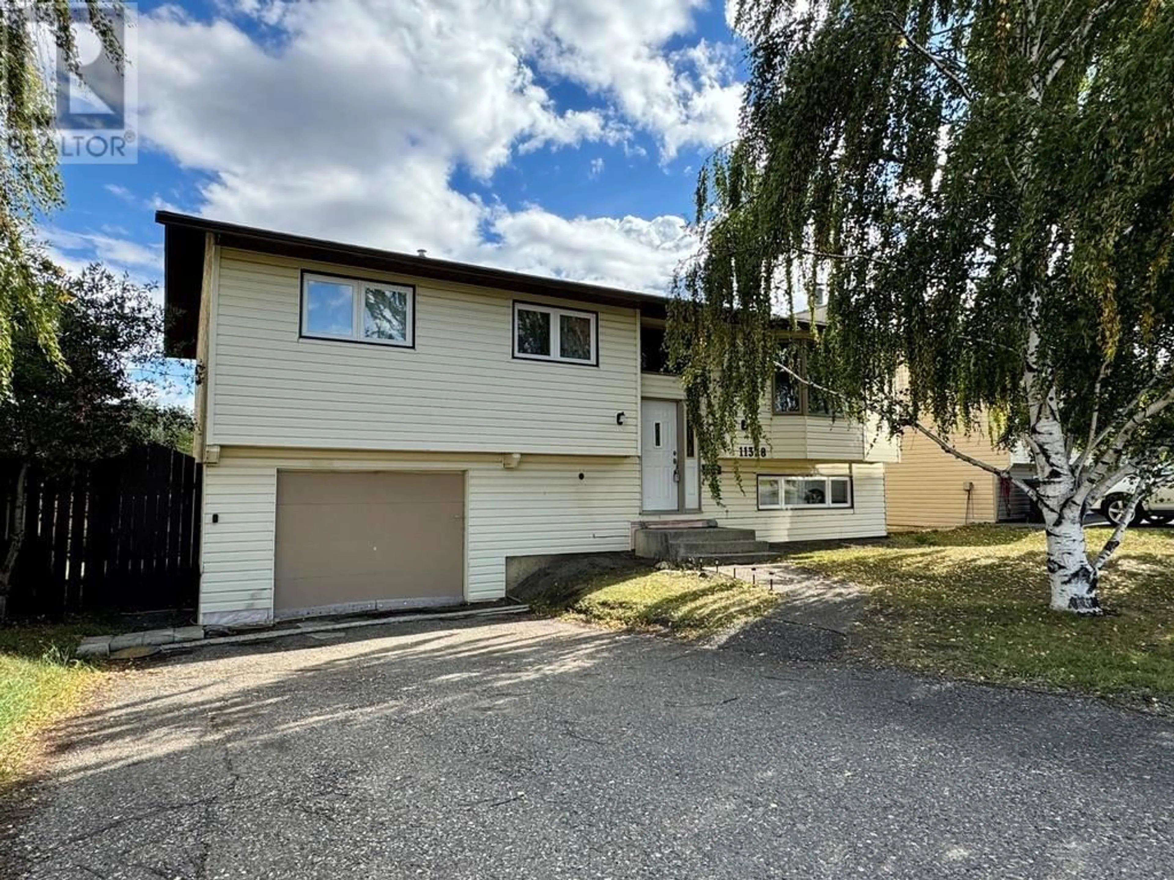 Frontside or backside of a home, the street view for 11328 17 Street, Dawson Creek British Columbia V1G4J5