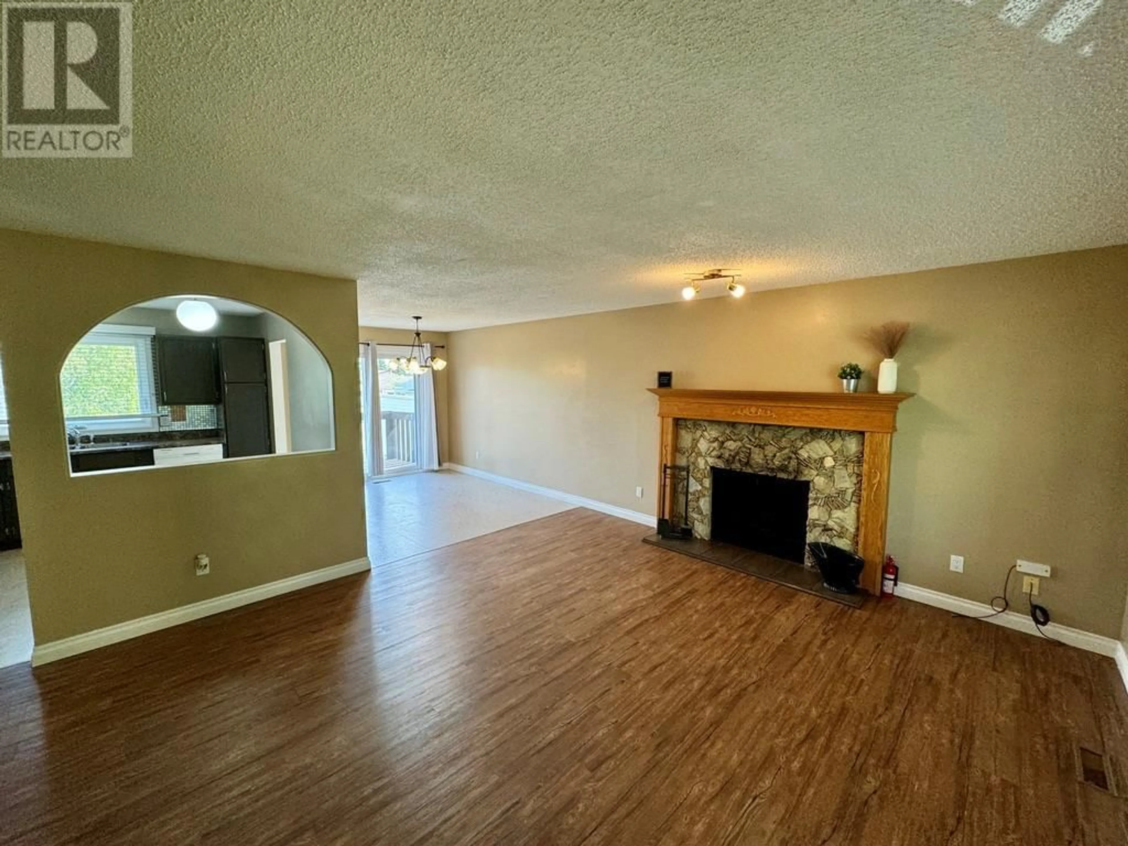 A pic of a room, wood floors for 11328 17 Street, Dawson Creek British Columbia V1G4J5