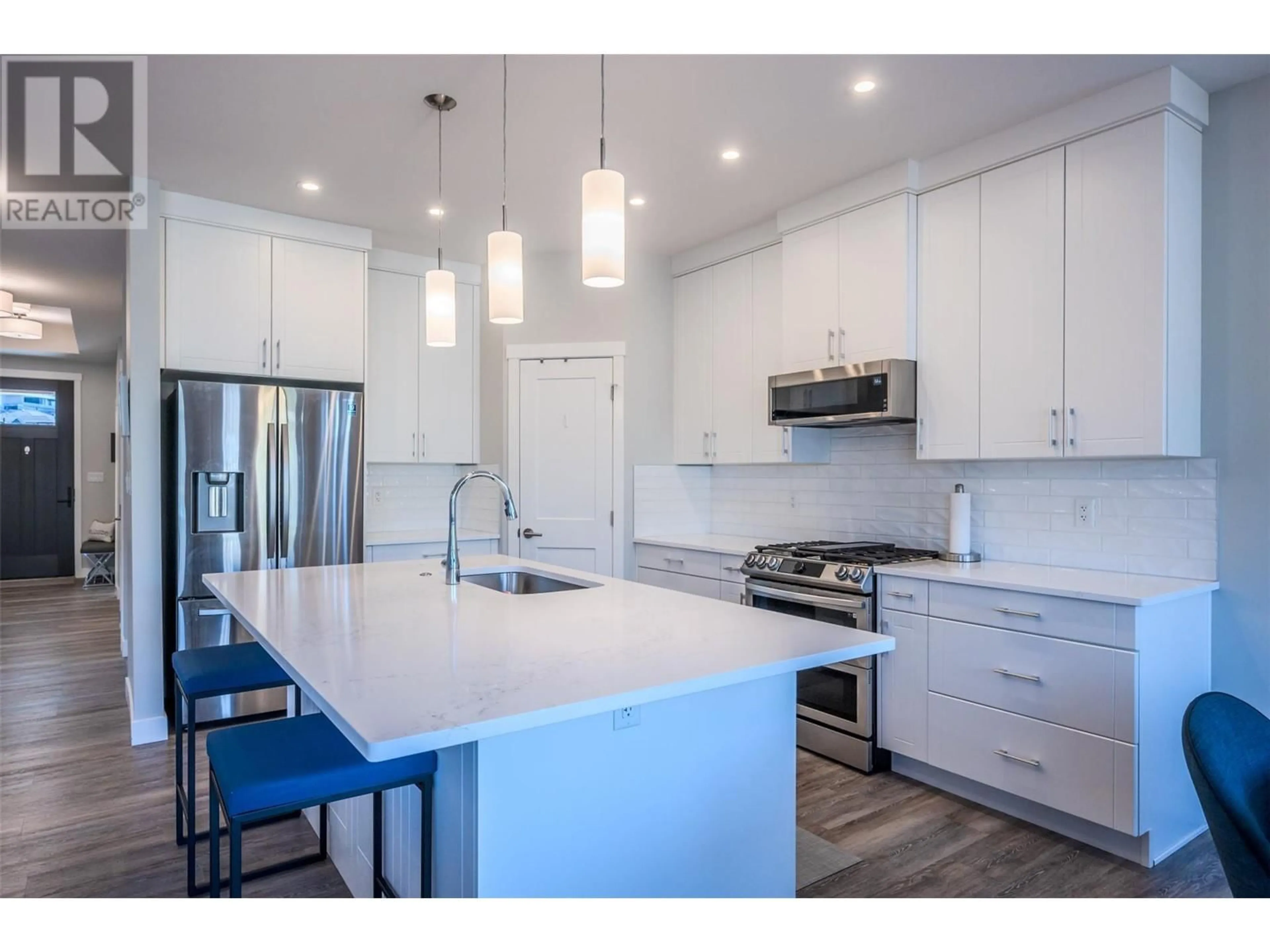 Open concept kitchen for 167 Sendero Crescent, Penticton British Columbia V2A0C3