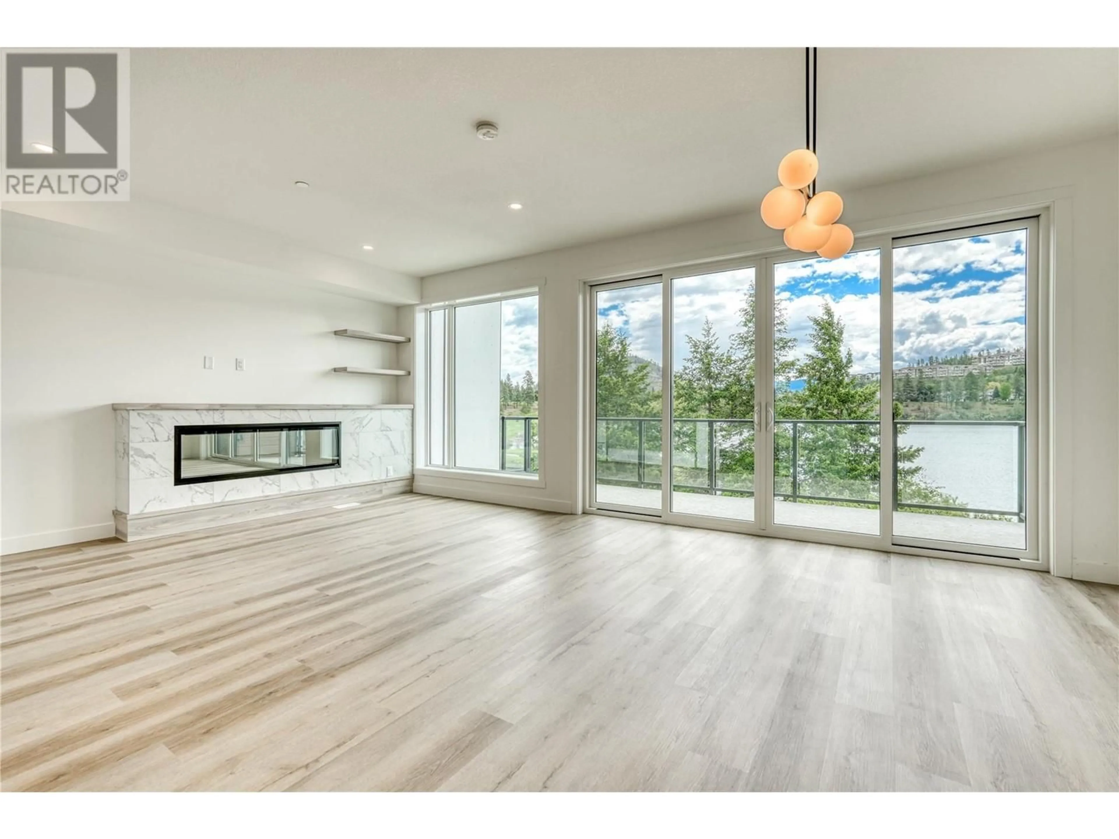 A pic of a room, wood floors for 2735 Shannon Lake Road Unit# 109, West Kelowna British Columbia V4T1V6