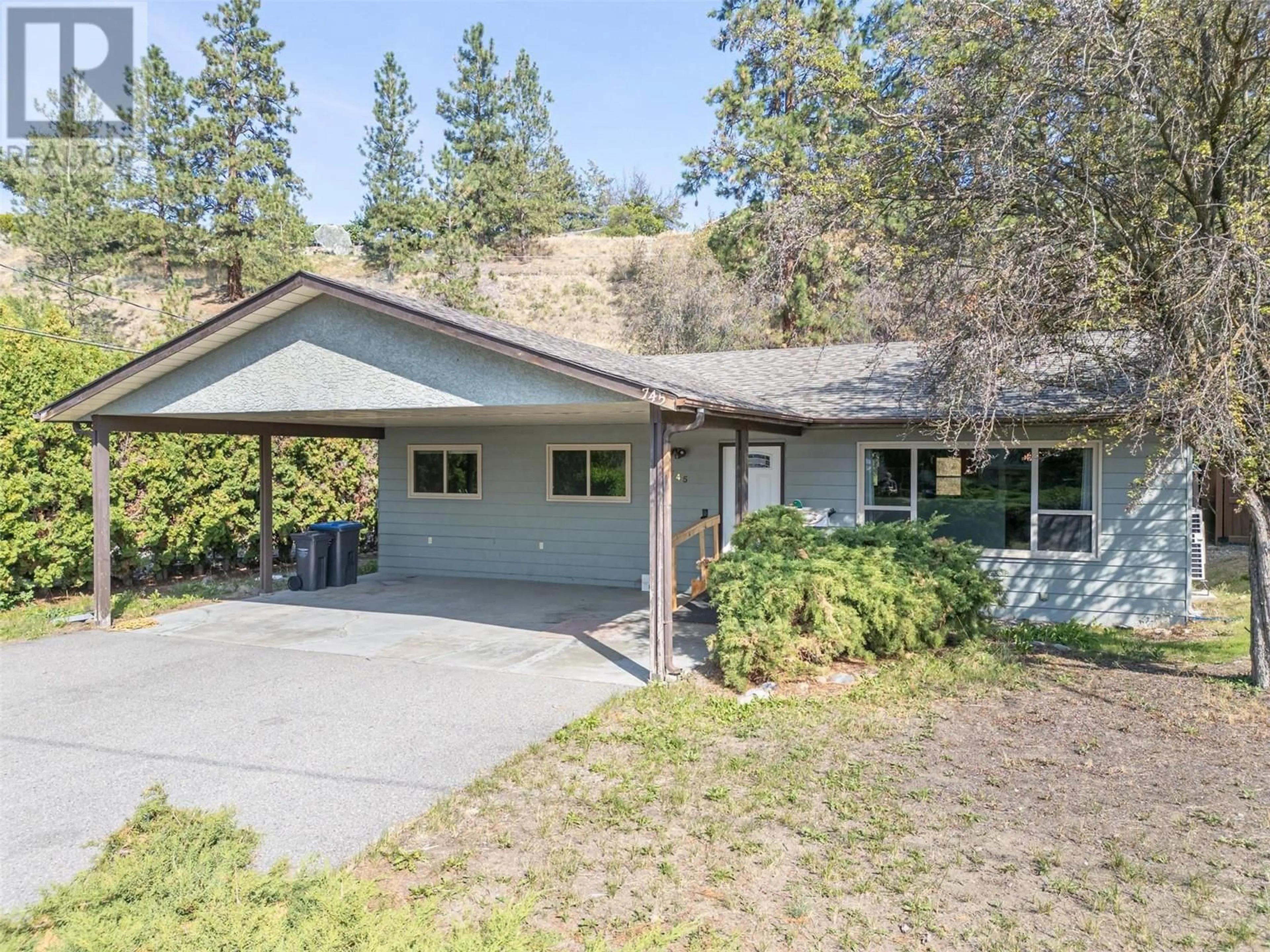 Frontside or backside of a home, cottage for 745 Camelia Road, Kelowna British Columbia V1X3M9