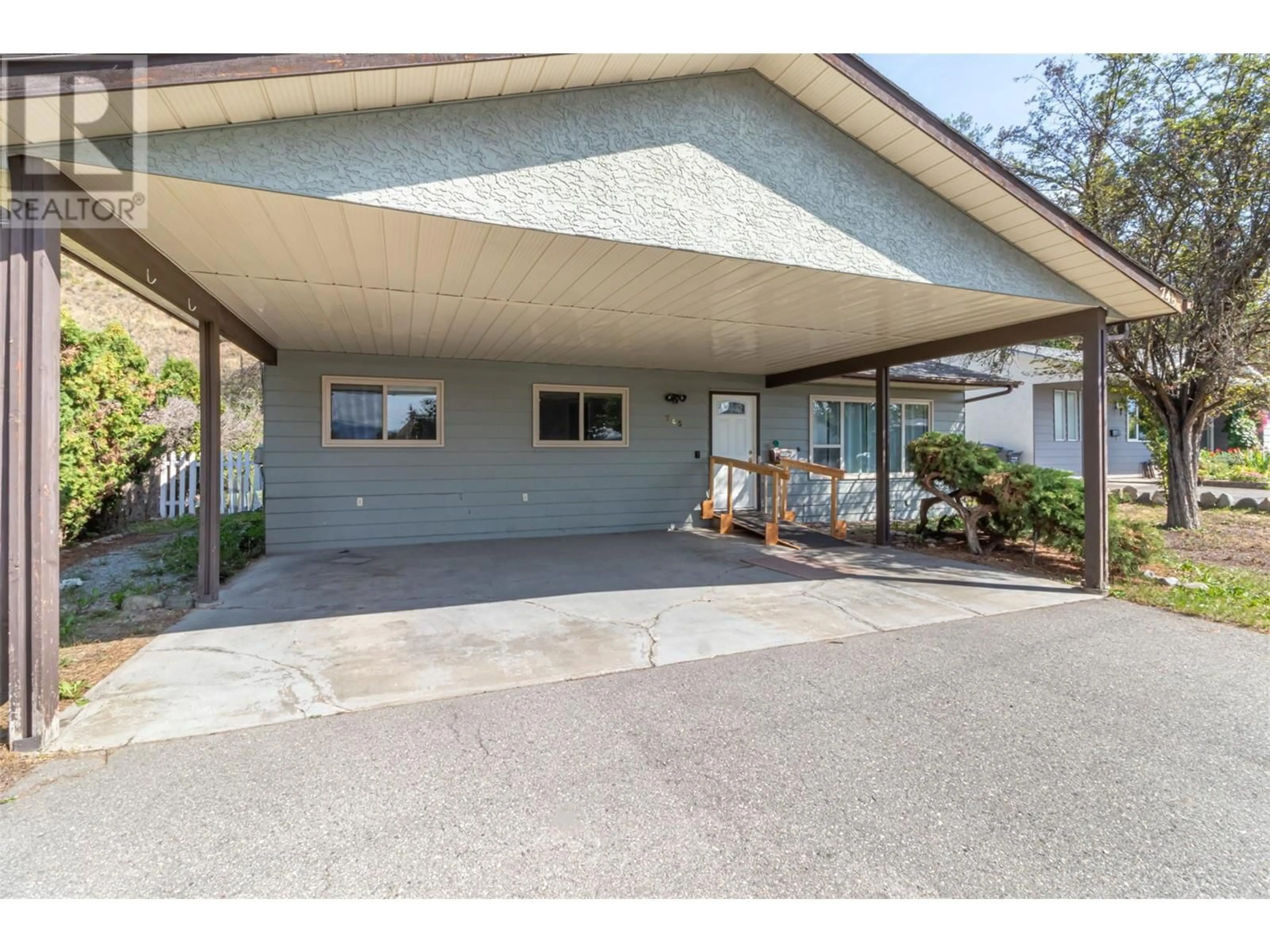 A pic from exterior of the house or condo, the front or back of building for 745 Camelia Road, Kelowna British Columbia V1X3M9