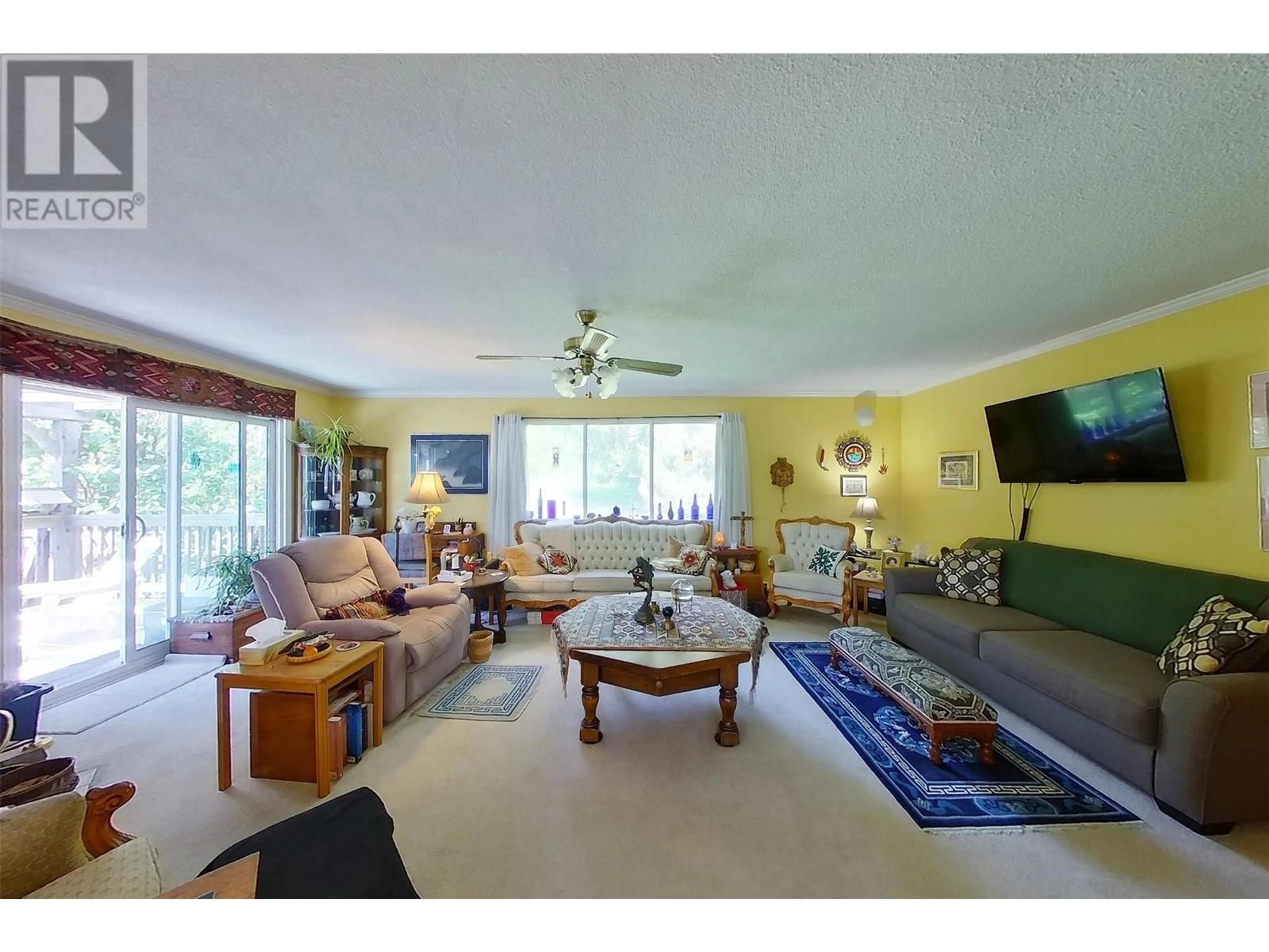 Living room, wood floors for 5404 Sunnybrae Canoe Pt Road Unit# 1, Tappen British Columbia V0E2X1