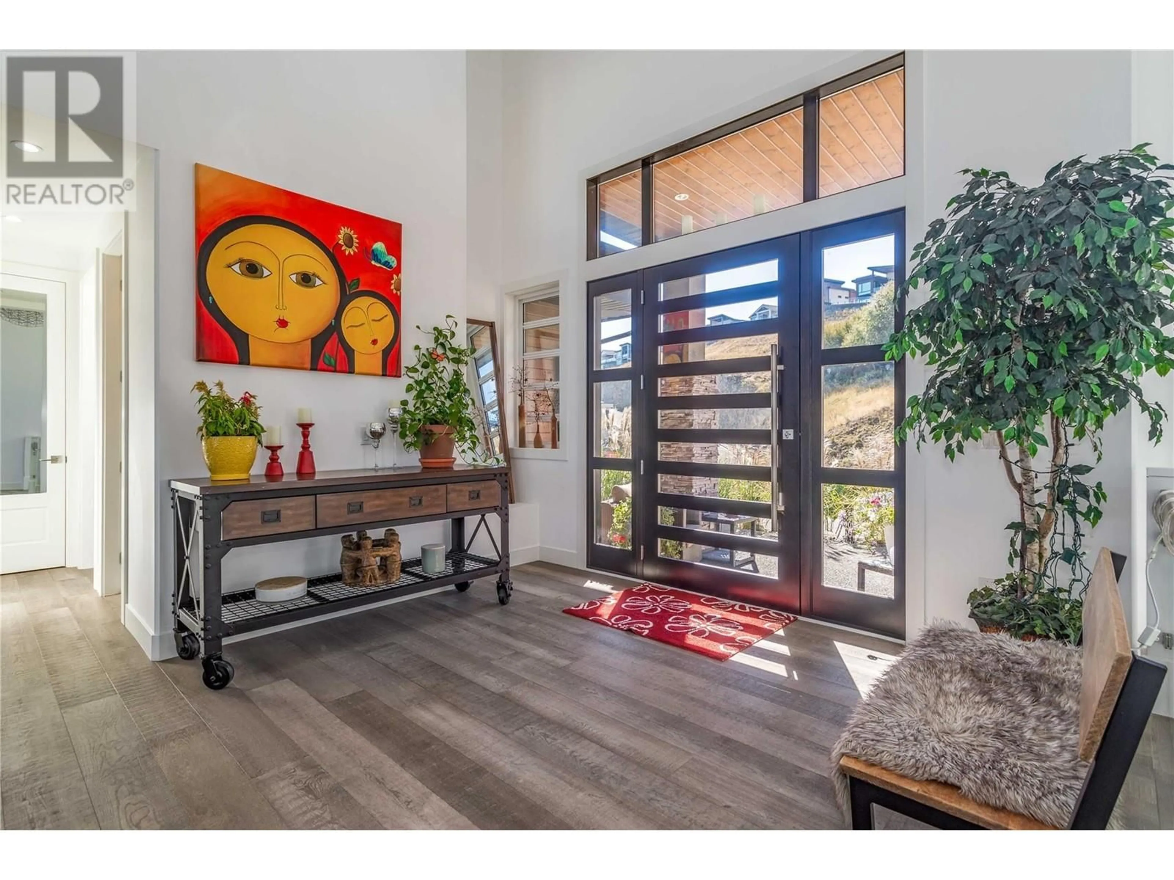 Indoor entryway, wood floors for 1016 Clarance Avenue, Kelowna British Columbia V1W5M6