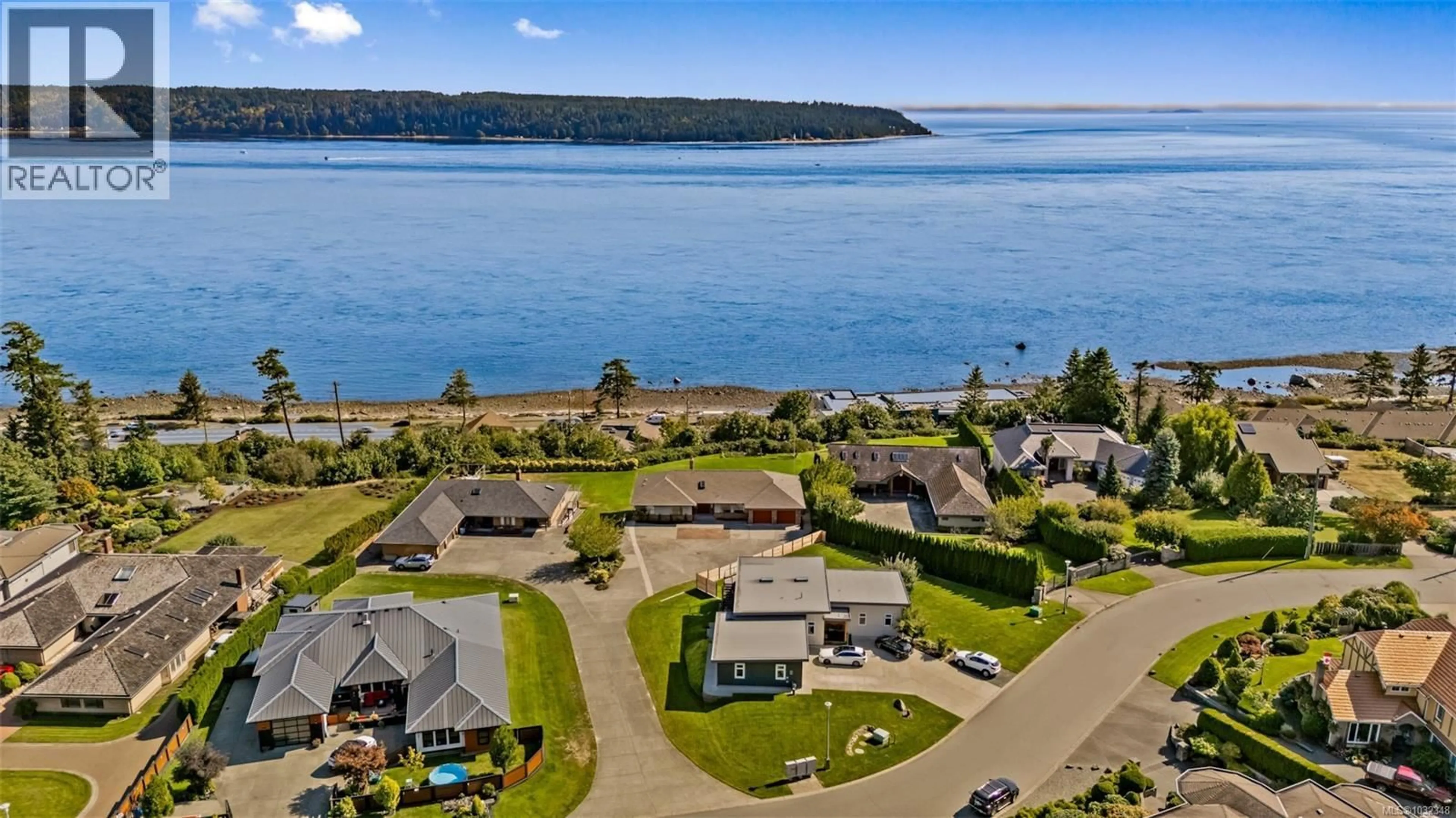 A pic from outside/outdoor area/front of a property/back of a property/a pic from drone, water/lake/river/ocean view for 513 ASH STREET, Campbell River British Columbia V9W5L8
