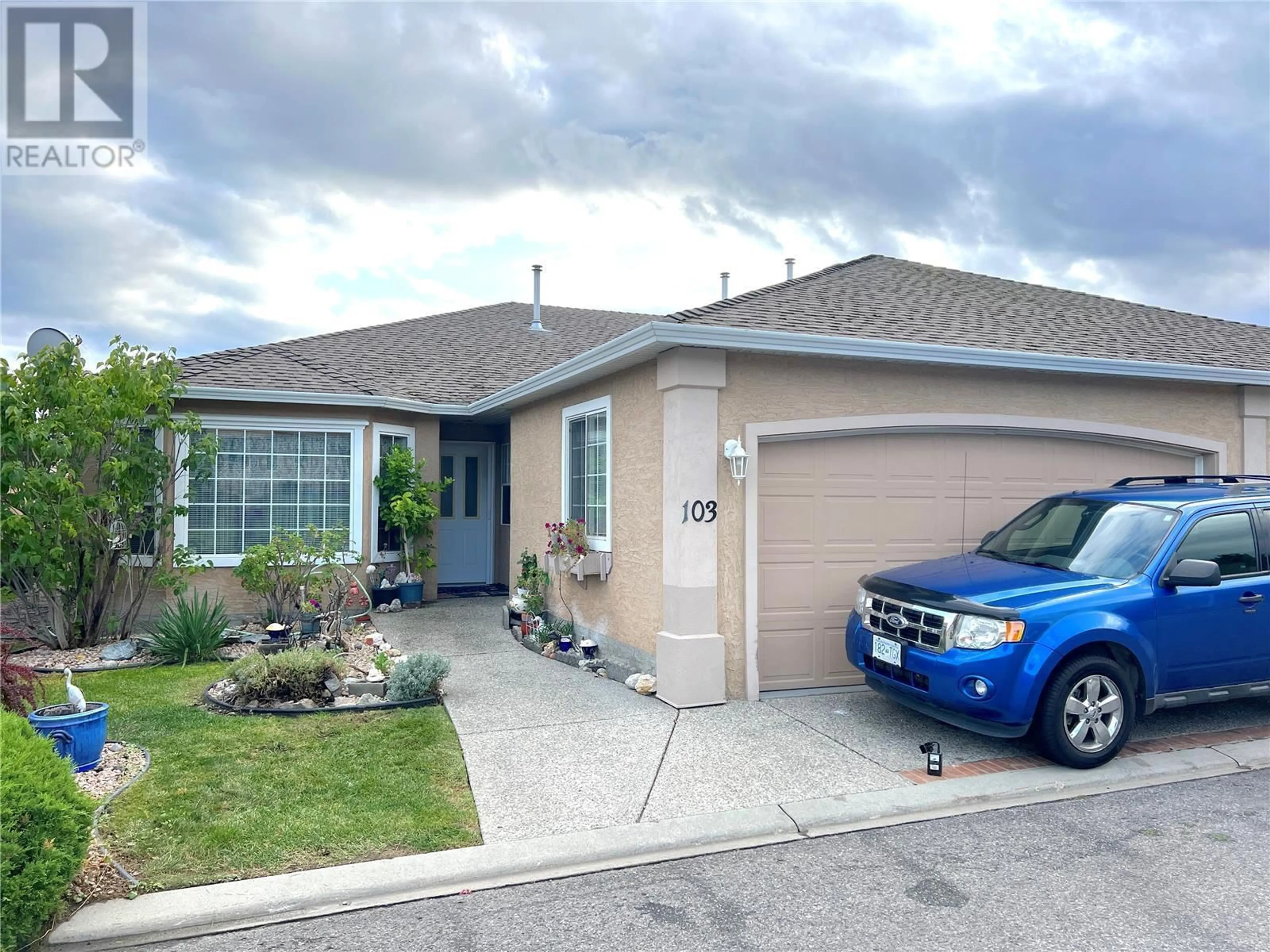 Frontside or backside of a home, the street view for 2250 Louie Drive Unit# 103, West Kelowna British Columbia V4T2M6