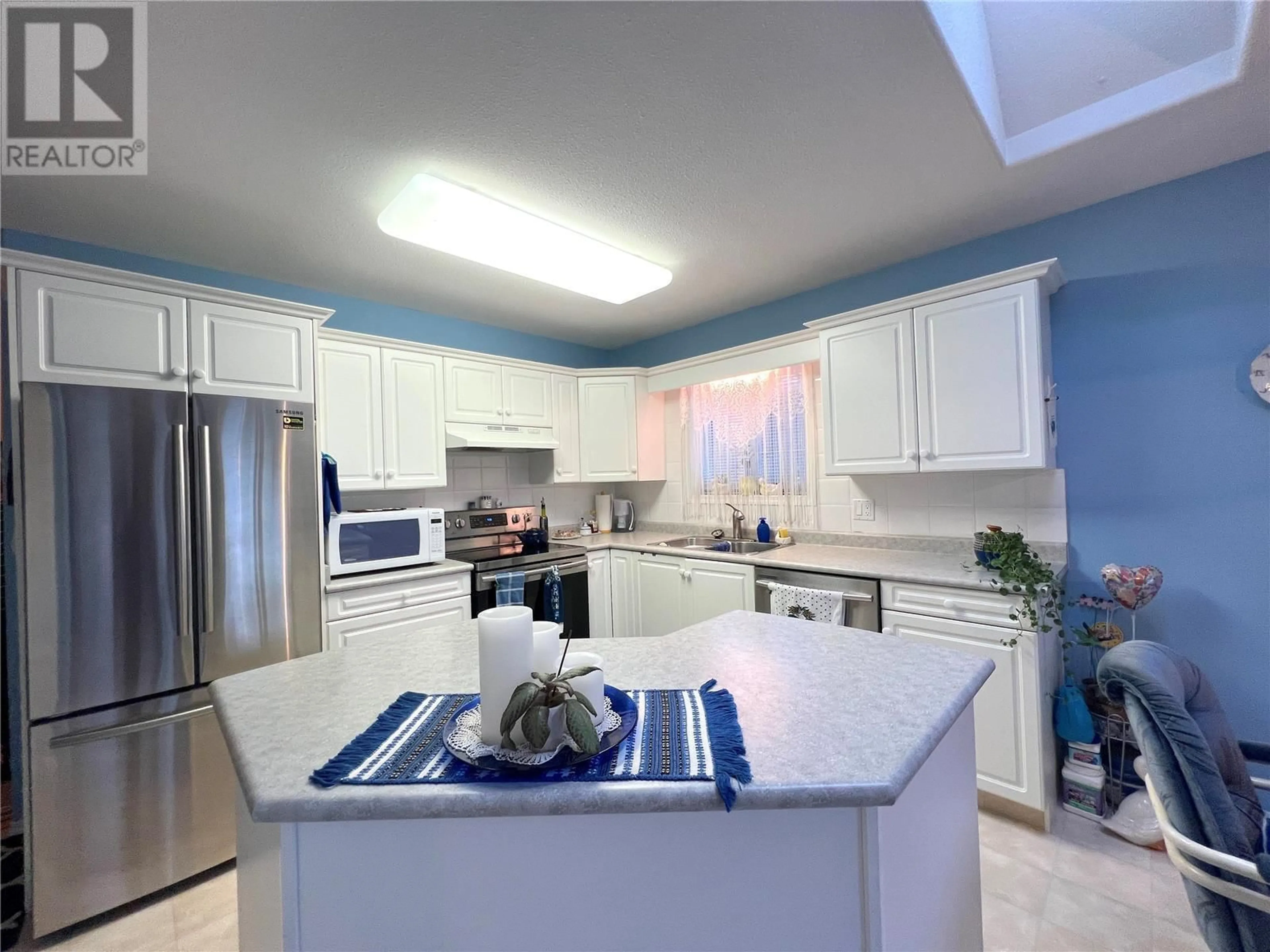 Kitchen, ceramic floors, cottage for 2250 Louie Drive Unit# 103, West Kelowna British Columbia V4T2M6