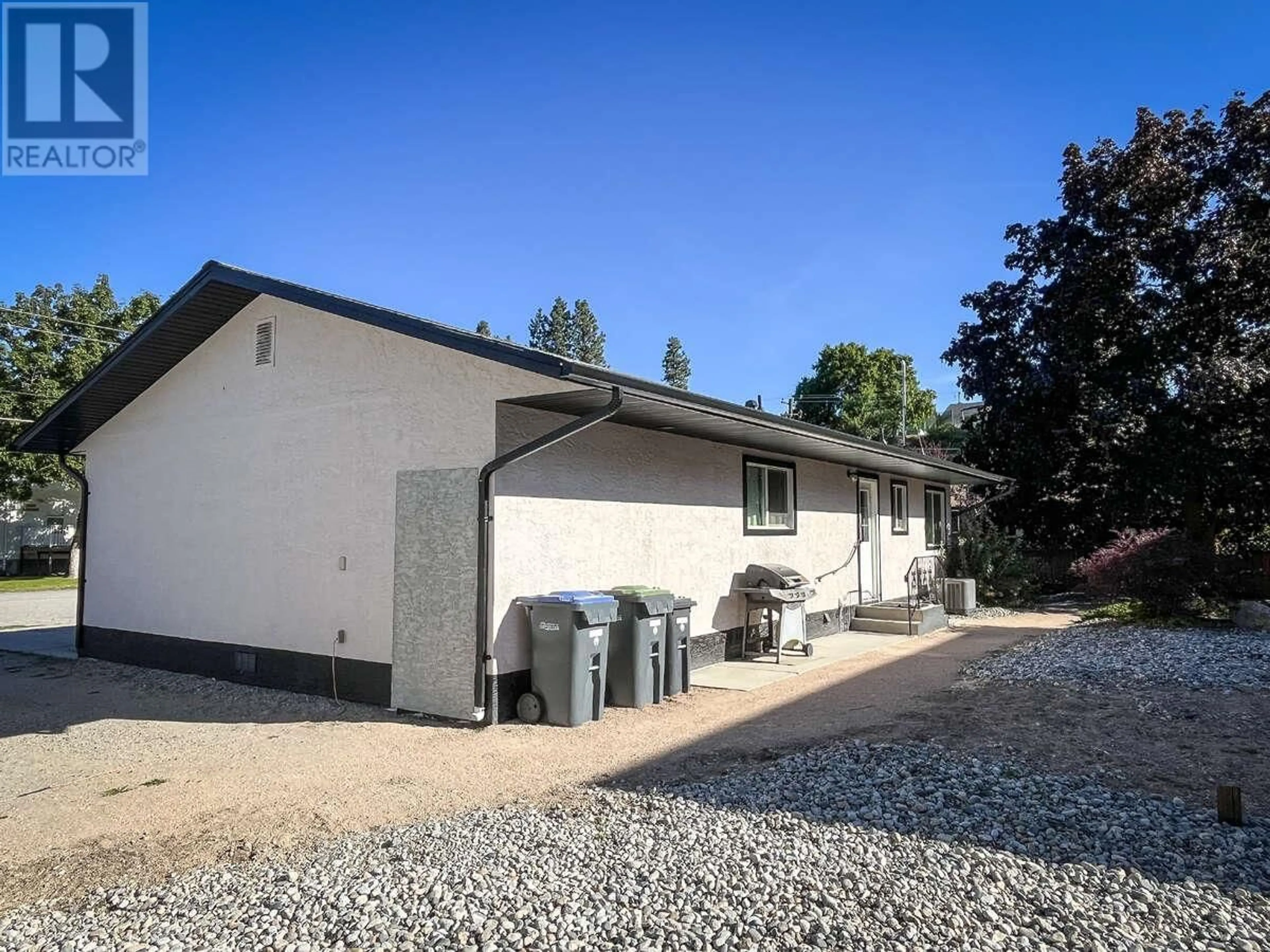 A pic from outside/outdoor area/front of a property/back of a property/a pic from drone, unknown for 13608 RUMBALL AVENUE, Summerland British Columbia V0E1Z0