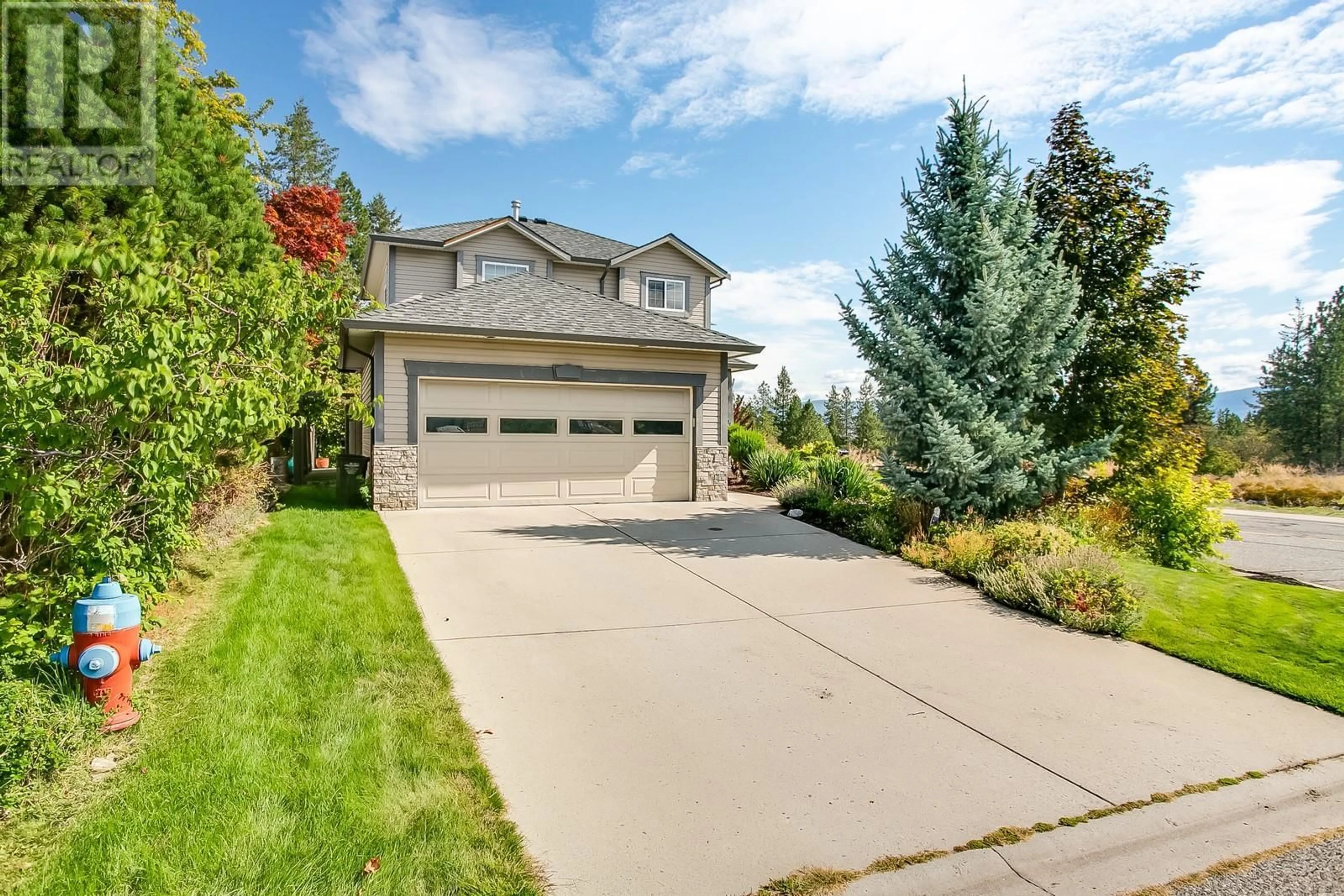 Frontside or backside of a home, the street view for 2096 Rosefield Drive, West Kelowna British Columbia V1Z3Y8