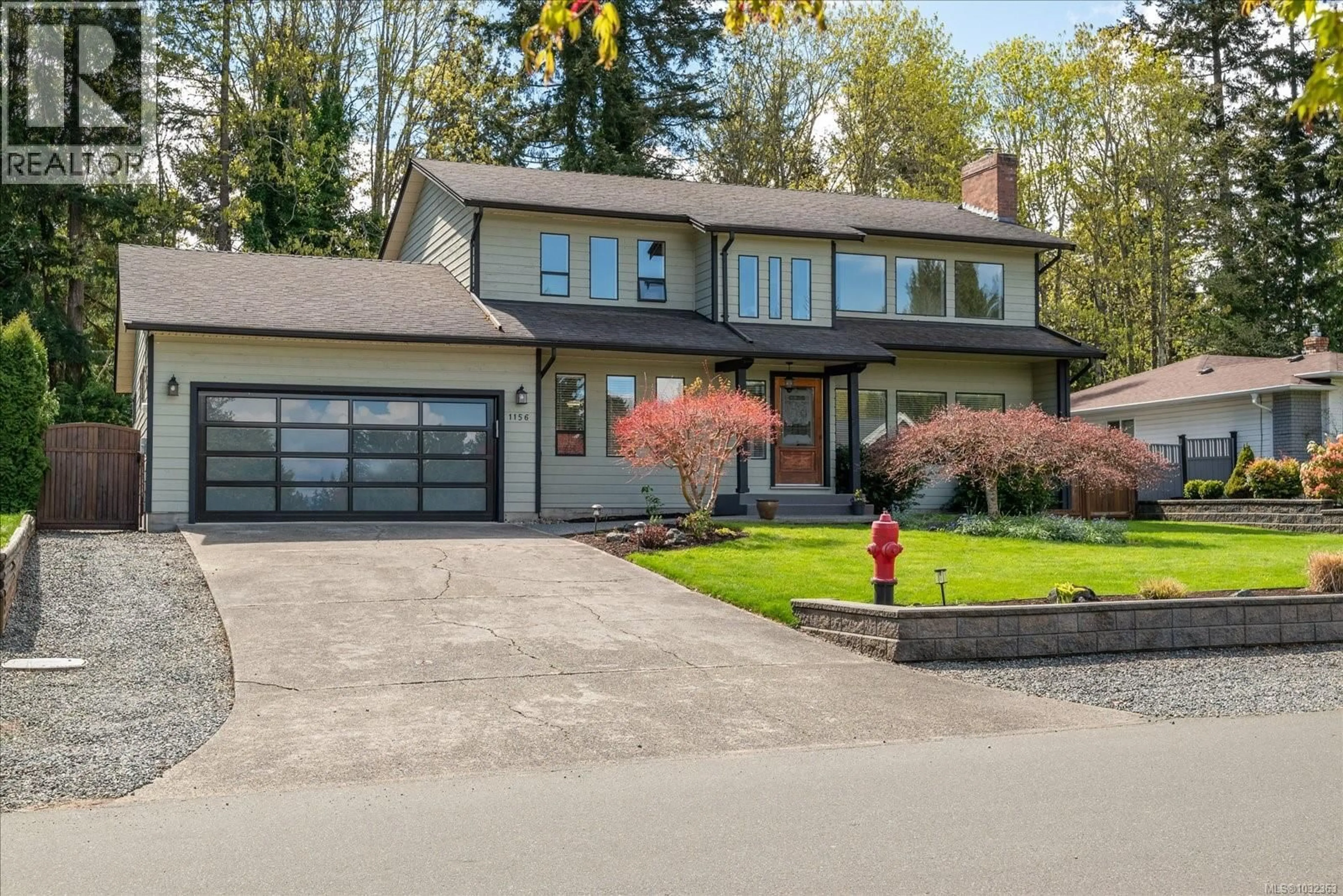 Home with vinyl exterior material, street for 1156 CLUBHOUSE DRIVE, Qualicum Beach British Columbia V9K1C4