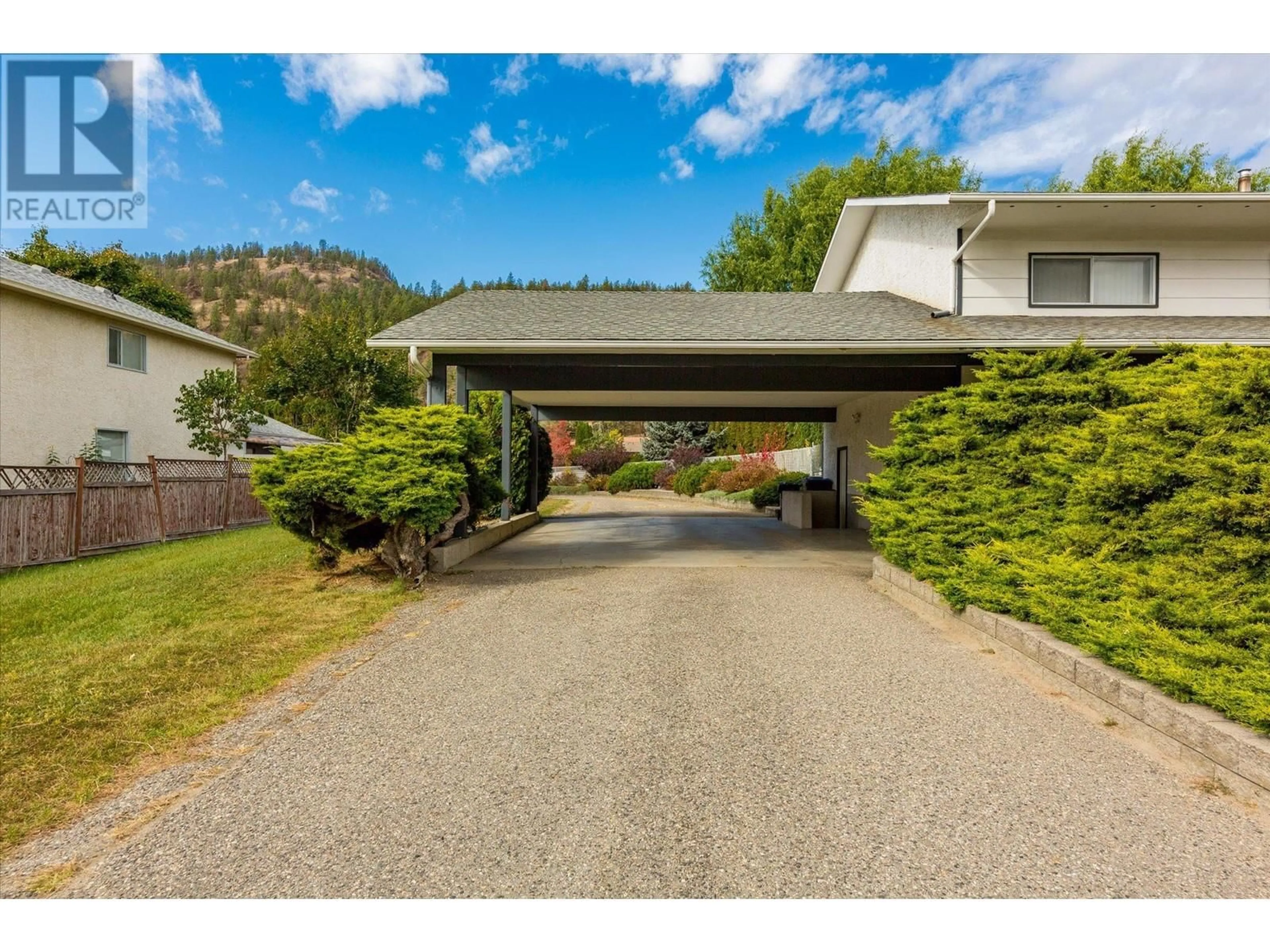 A pic from exterior of the house or condo, the street view for 328 Glenmore Road, Kelowna British Columbia V1V1P2