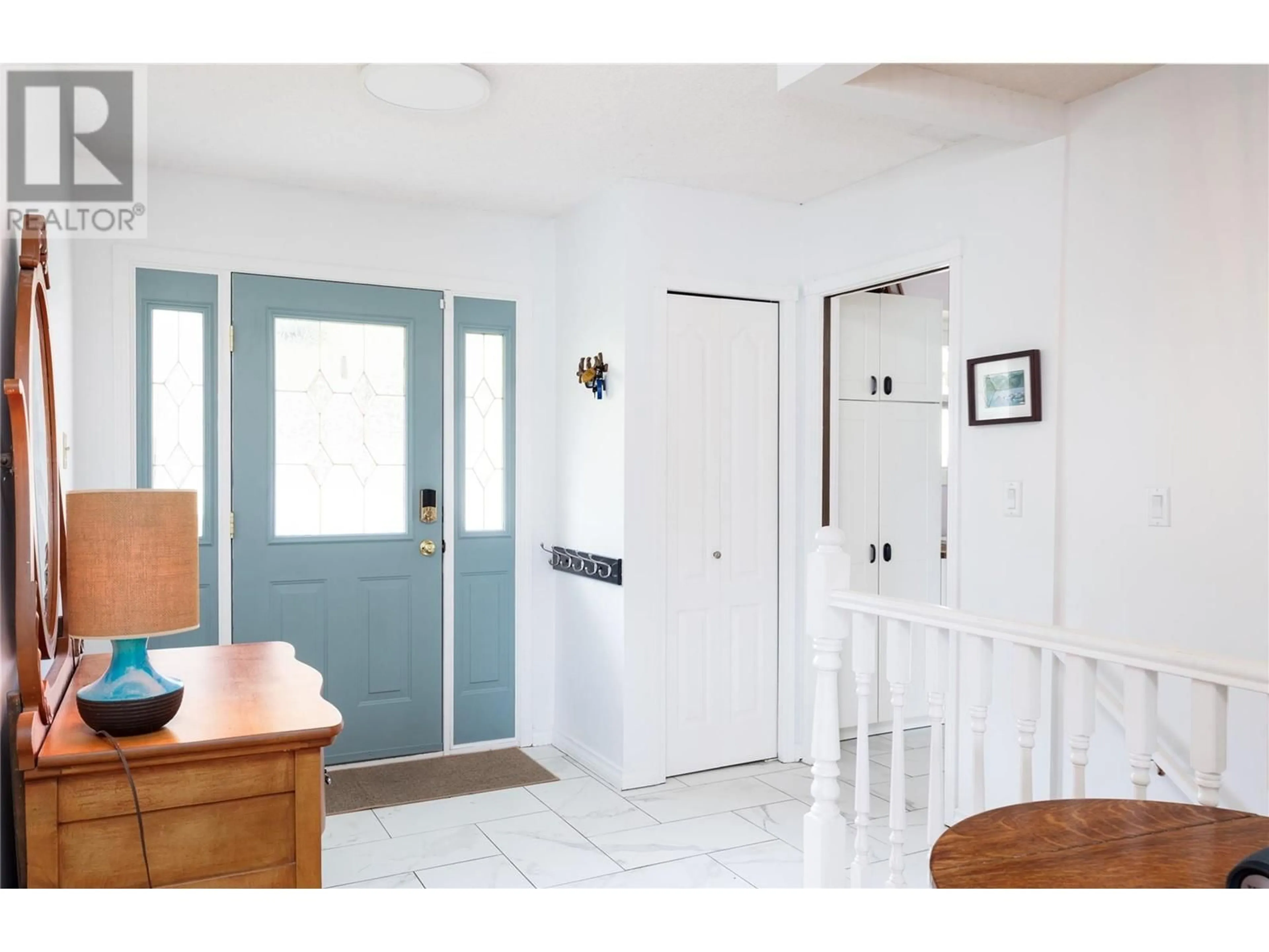 Indoor entryway, wood floors for 5253 Clarence Road, Peachland British Columbia V0H1X2